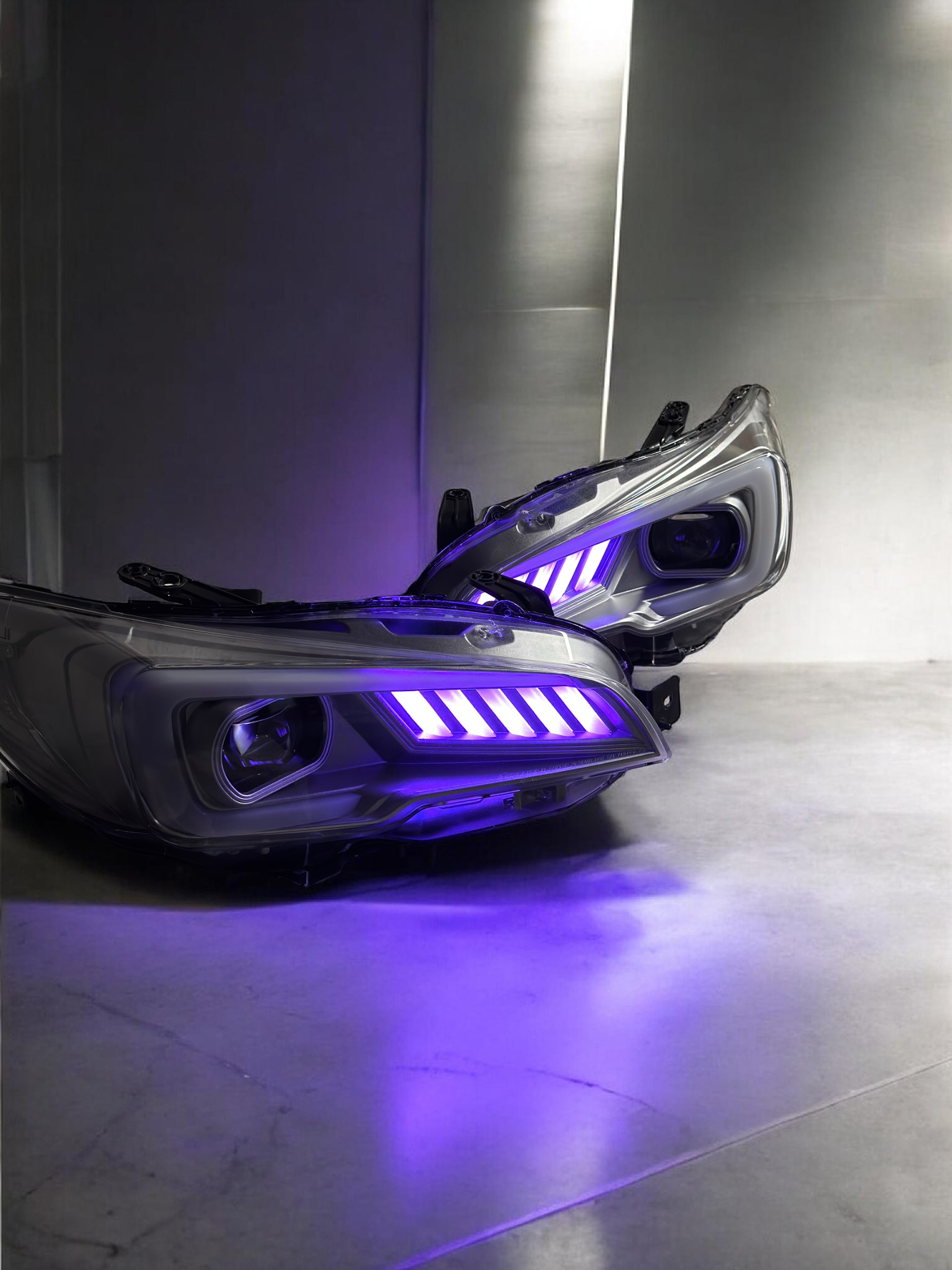 Partially open futuristic car door with purple LED lights inside a metallic room.