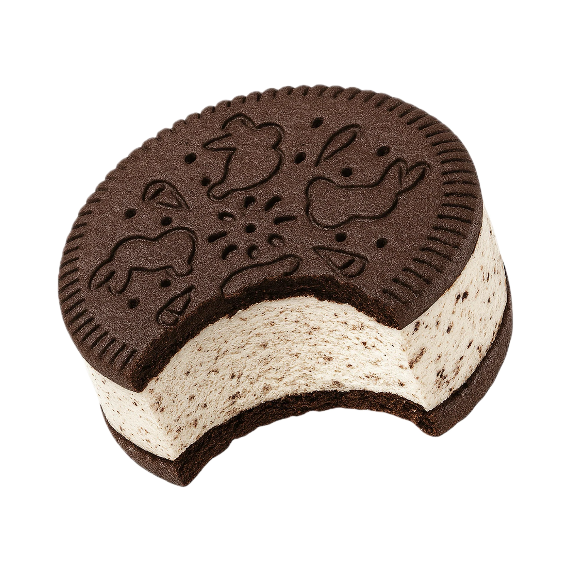 Close-up of a chocolate cookie with embossed animal shapes, including a lion, horse, and bird, on its surface.