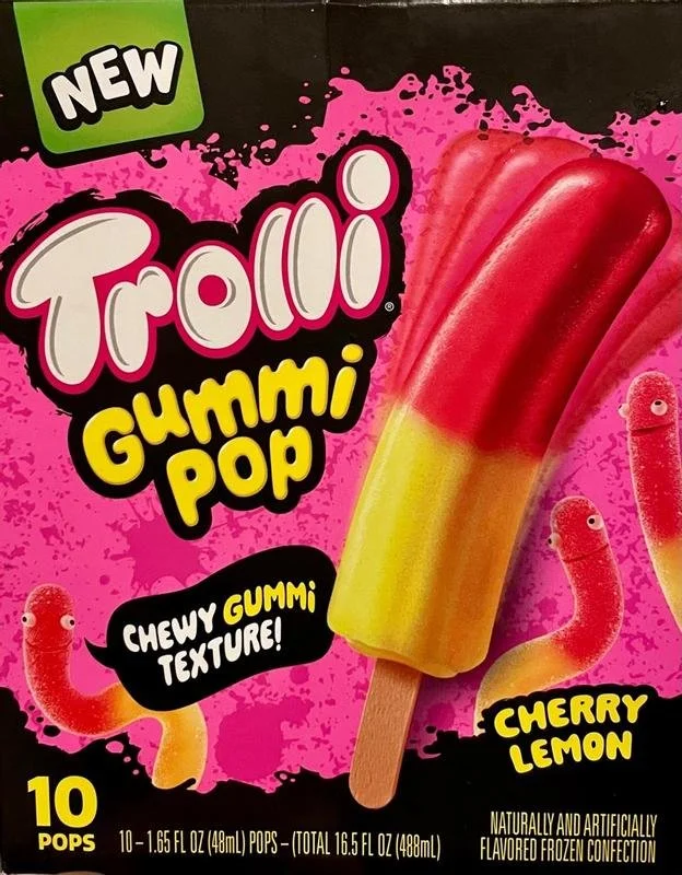 Package of Trolli Gummi Pop Chewy Gummi Textures in cherry lemon flavor. Shows an ice pop-shaped gummi candy with red and yellow colors, and cartoon worms on the package.