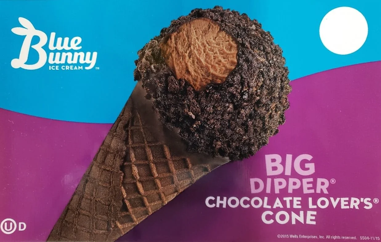 Ice cream cone with a chocolate dip and a cookie on top, from Blue Bunny, called Big Dipper Chocolate Lover's Cone.