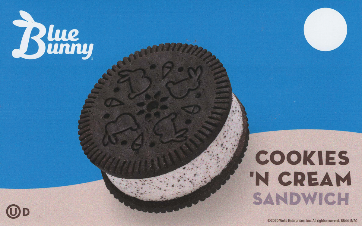 Packaging of Blue Bunny Cookies 'n Cream Sandwich, featuring an image of a cookies and cream ice cream sandwich with a chocolate cookie top with cookie designs and a vanilla ice cream filling with cookie bits, set against a blue background with a whi