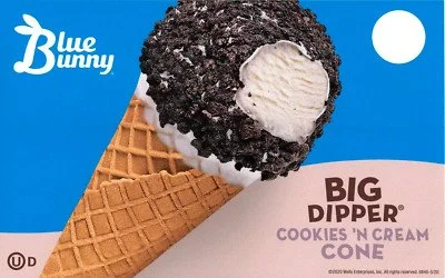 Ice cream cone with cookies and cream flavor, topped with crushed cookies, against a blue background with a white circle. The brand name Blue Bunny is in the top left corner.