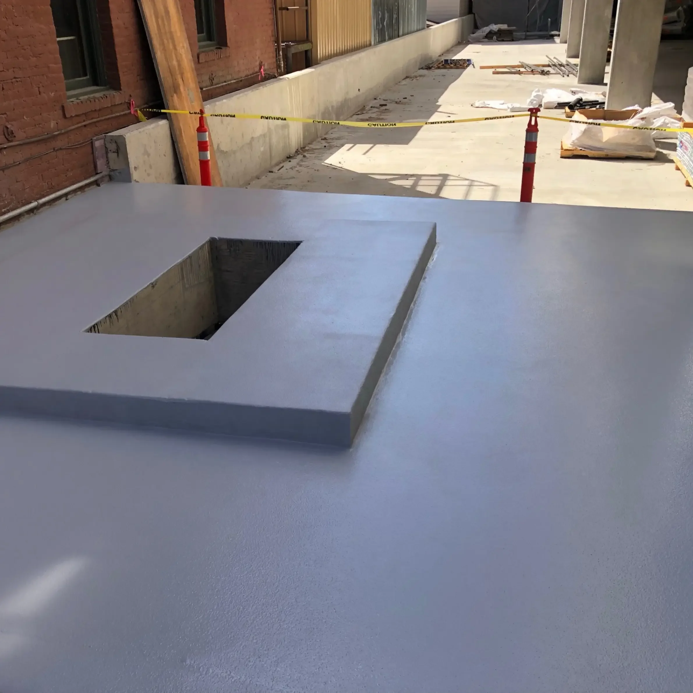 coated concrete slab with a framed opening