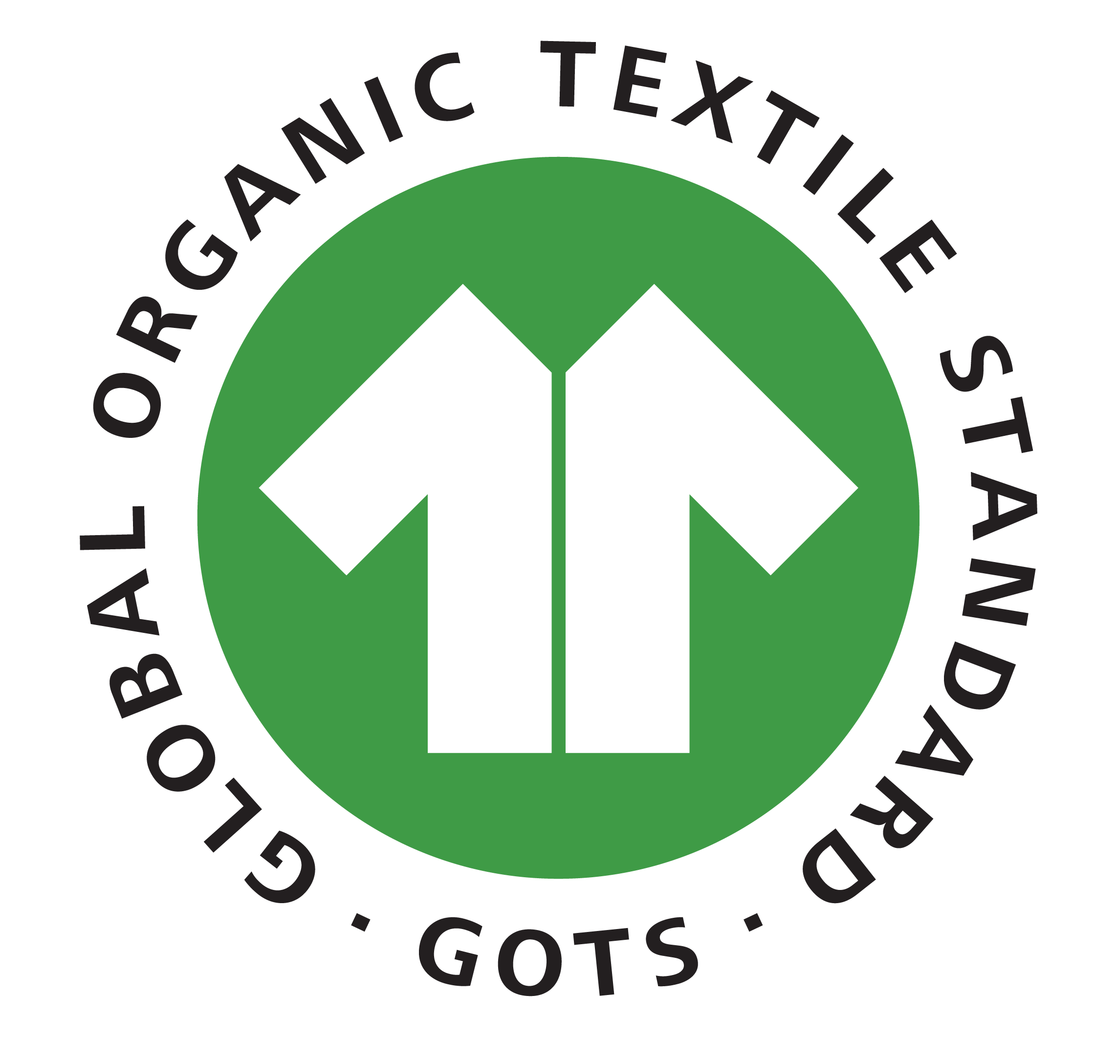 A circular logo with a green border and black background. Inside the circle, there are two white mountain peaks and two white trees. Curved text around the top reads 'ORGANIC TECTI'. Around the bottom, the faint text reads 'GOTS'.