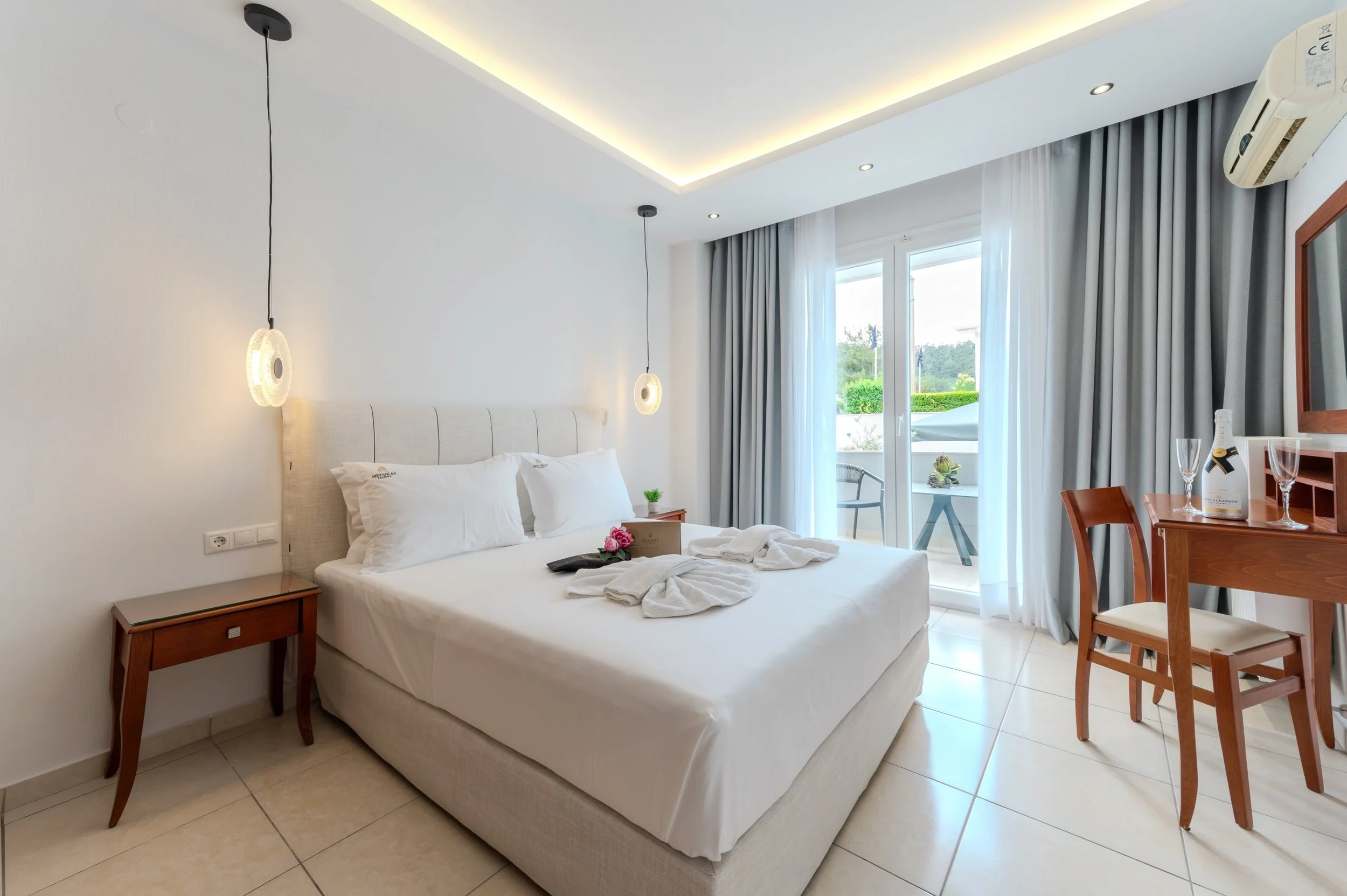 Wake up refreshed. Step into the beauty of Thassos.

Elegant interiors, natural light, and every comfort you need for a relaxing island getaway. At Metsikas Residence, every room is designed to make you feel at home from the moment you arrive.

Your 