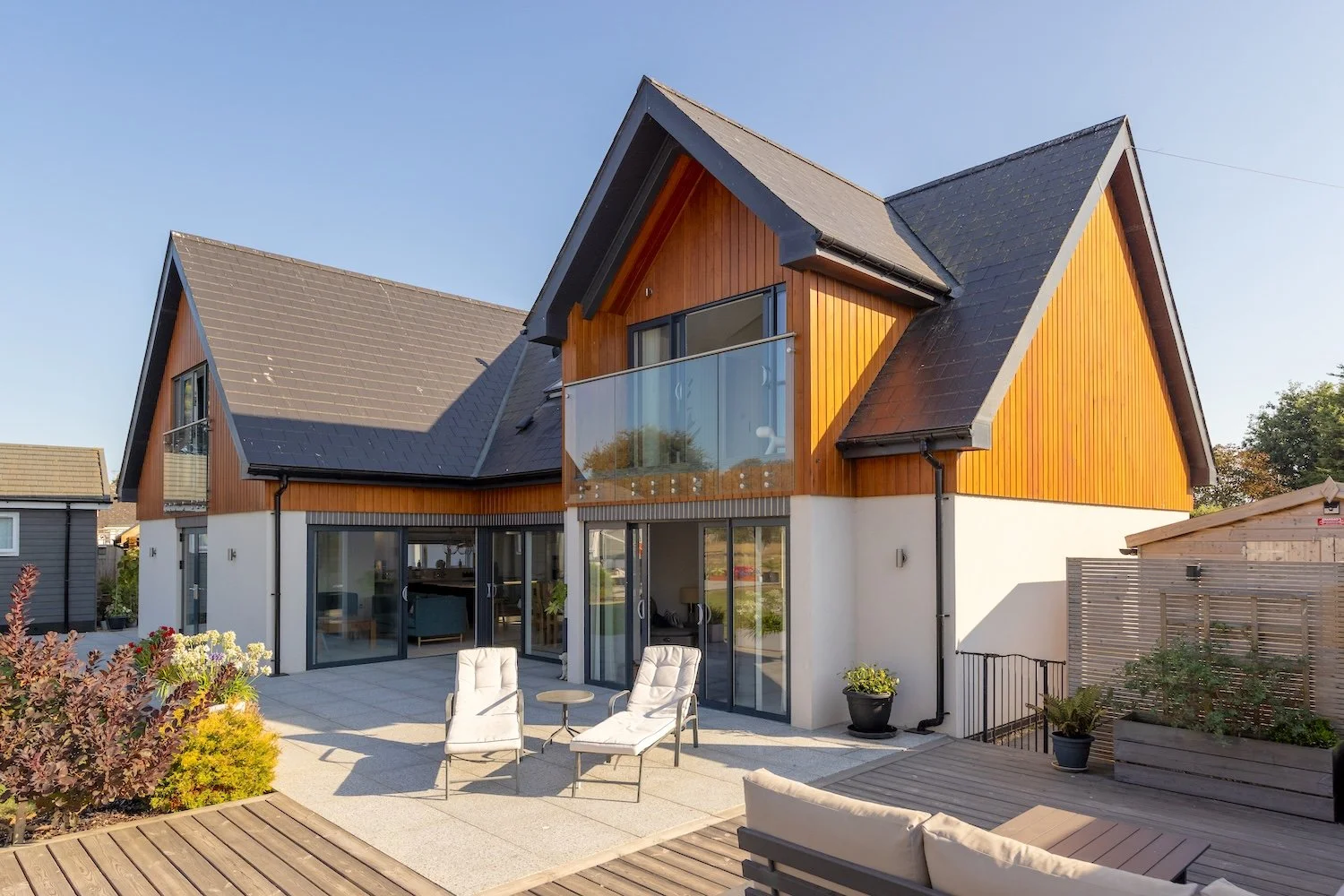 rear-elevation-glass-balcony-patio-terrace-selsey.jpg