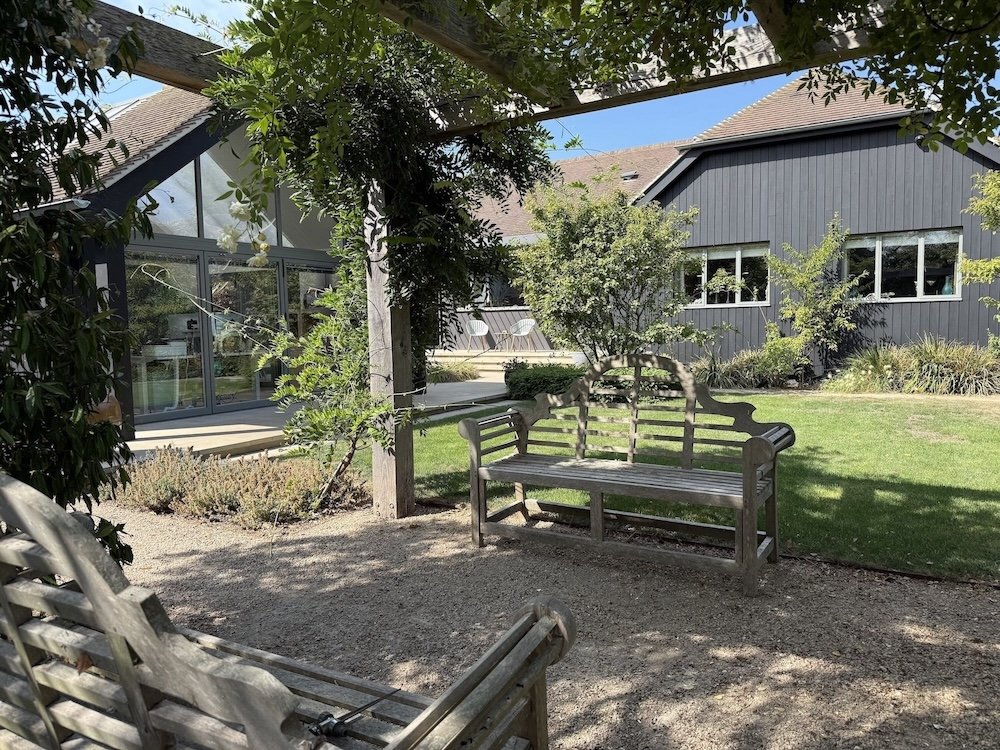 black-clad-bungalow-extension-pergola-garden-bench-itchenor.jpeg