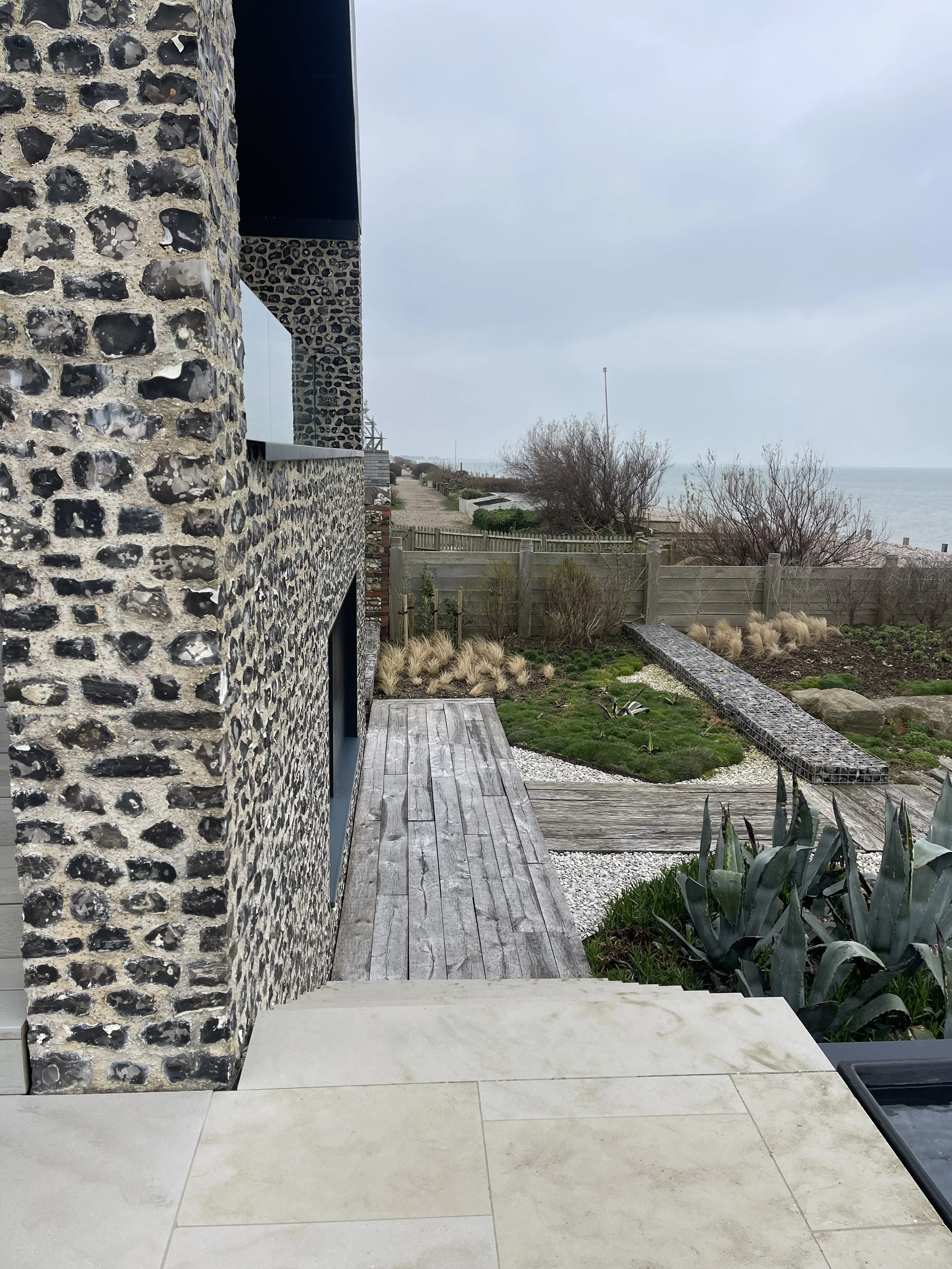 flint-wall-coastal-garden-marine-drive-west-wittering-wscb.jpeg