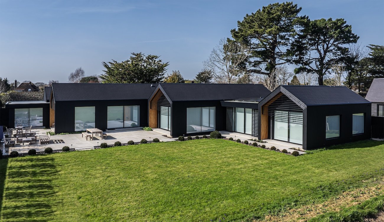 black-timber-pavilion-home-lawned-garden-birdham.jpeg