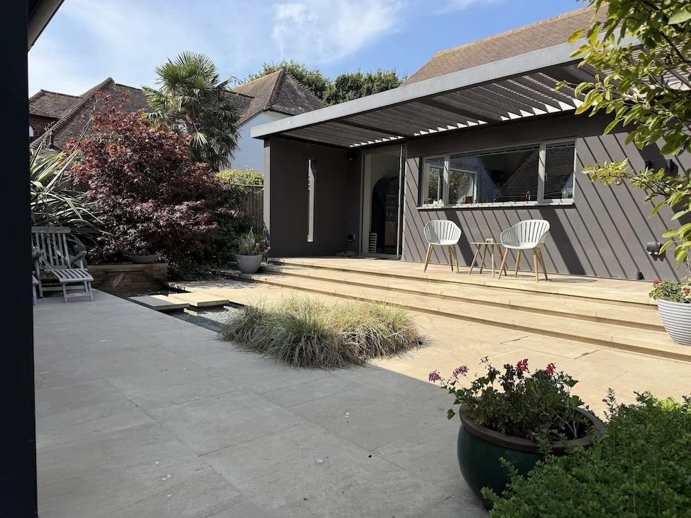 modern-patio-pergola-stepping-stone-water-feature-itchenor.jpeg