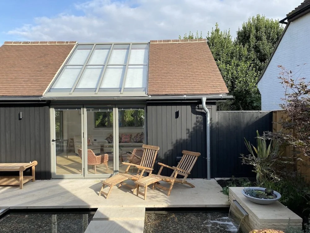 contemporary-bungalow-extension-rooflights-black-cladding-sussex.jpeg