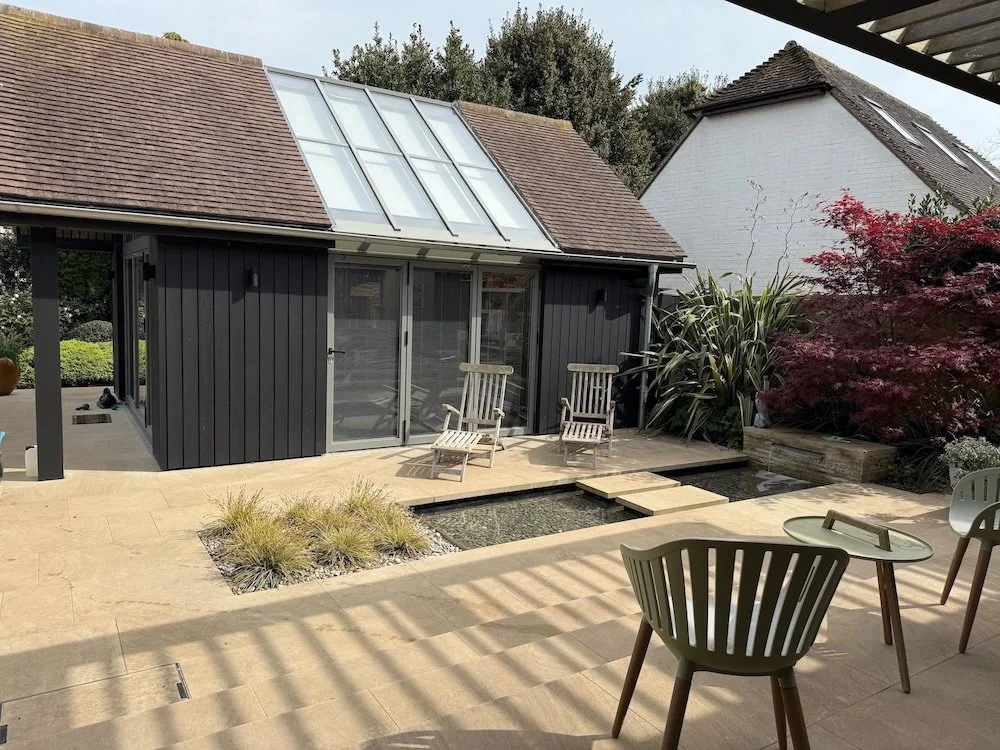 modern-patio-water-feature-stepping-stones-renovation-sussex.jpeg