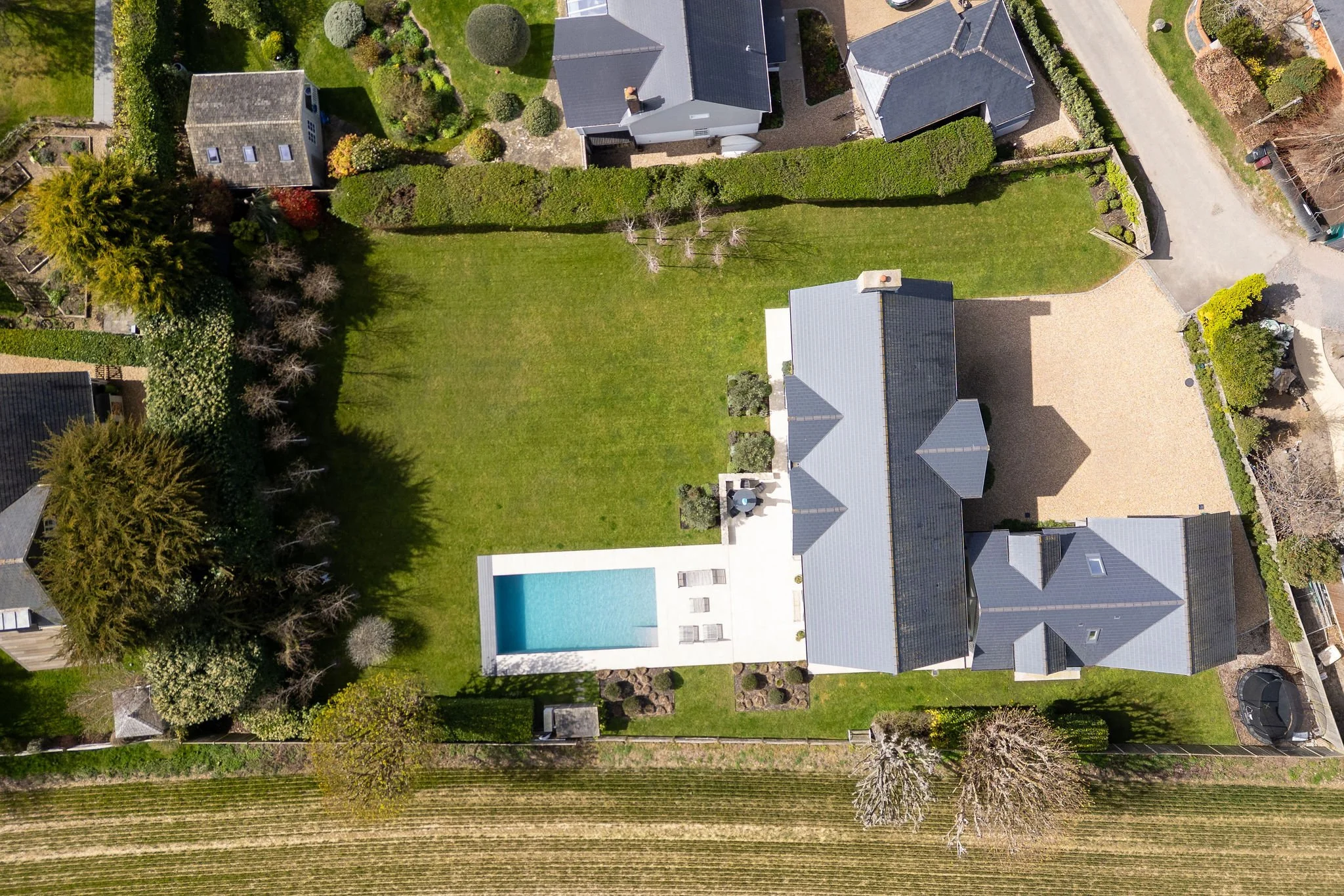 top-down-aerial-view-house-pool-gravel-driveway-birdham.jpg
