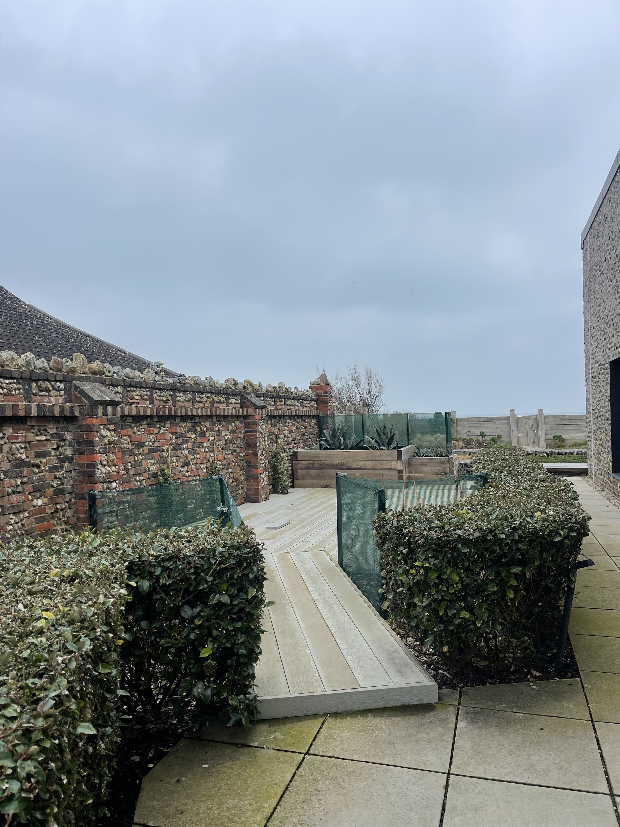 ide-decking-flint-boundary-wall-west-wittering-wscb.jpeg