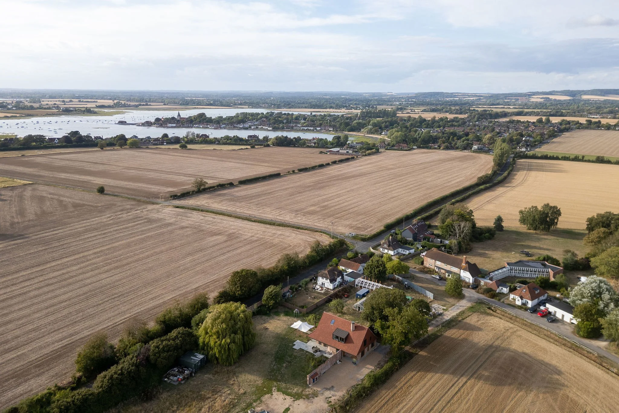 wscb-sips-new-build-aerial-landscape-bosham-harbour.webp