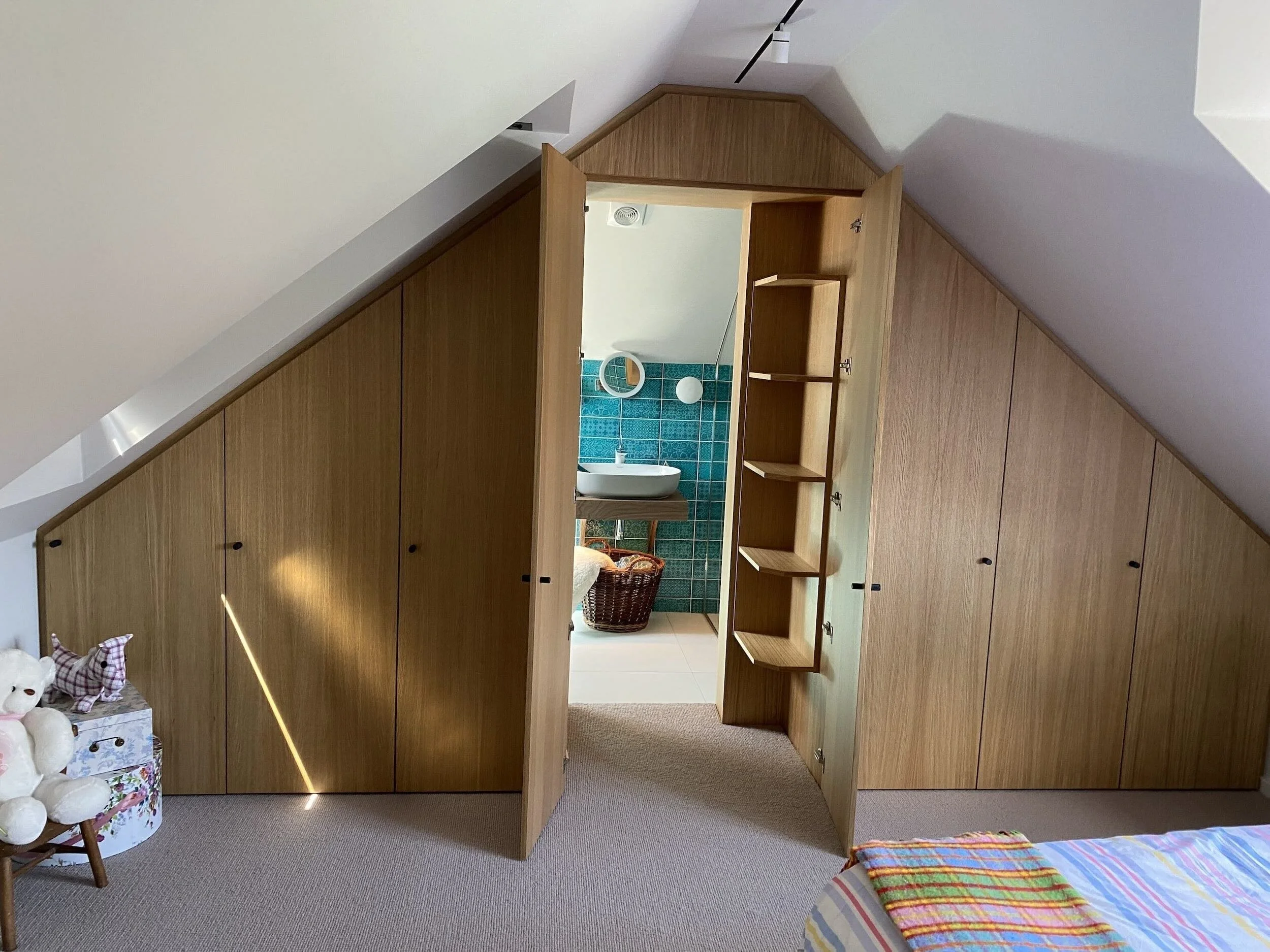 loft-conversion-hidden-en-suite-bathroom-door-itchenor.jpeg