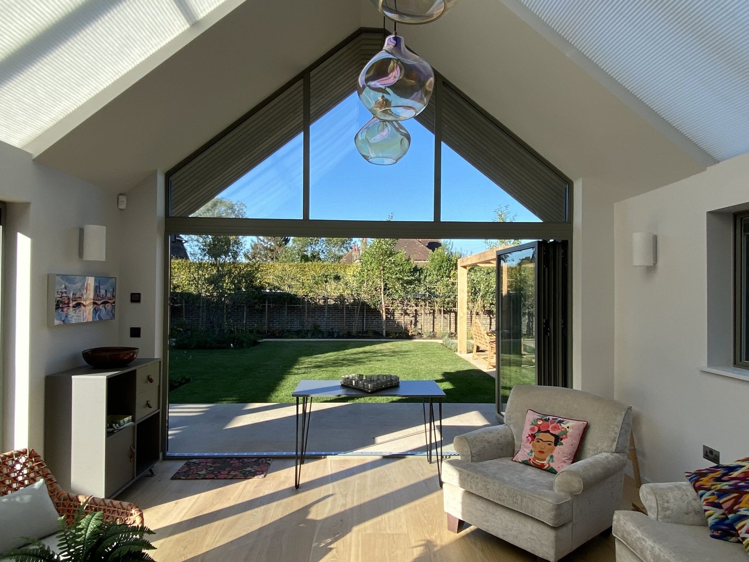 open-plan-living-room-vaulted-ceiling-full-height-glazing-sussex.jpeg