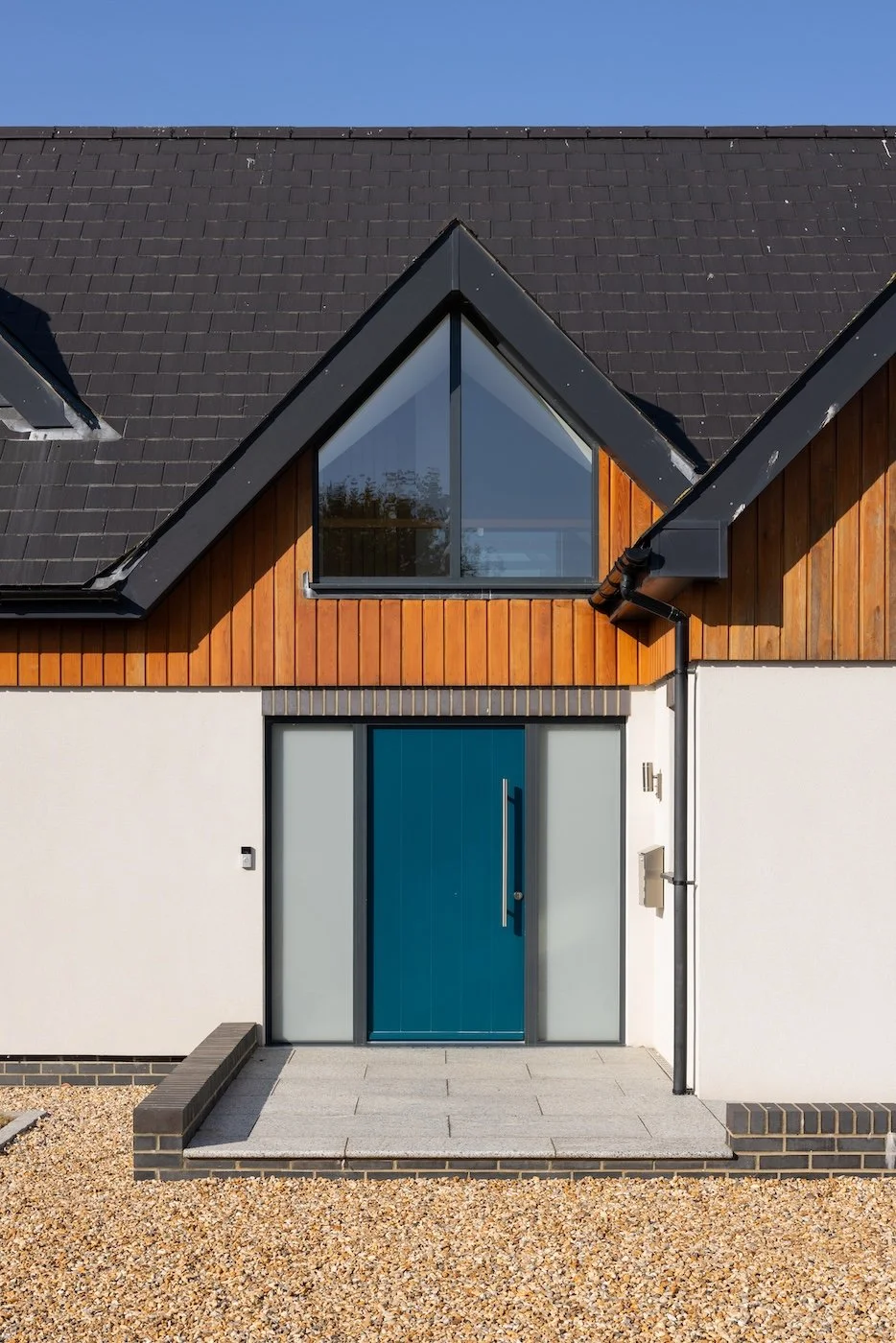 teal-front-door-gabled-porch-sips-house-selsey.jpg
