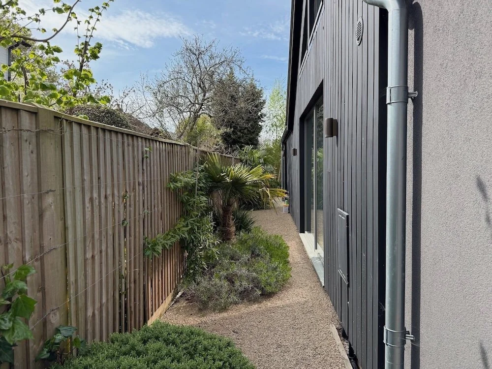 side-elevation-black-vertical-cladding-gravel-path-itchenor.jpeg