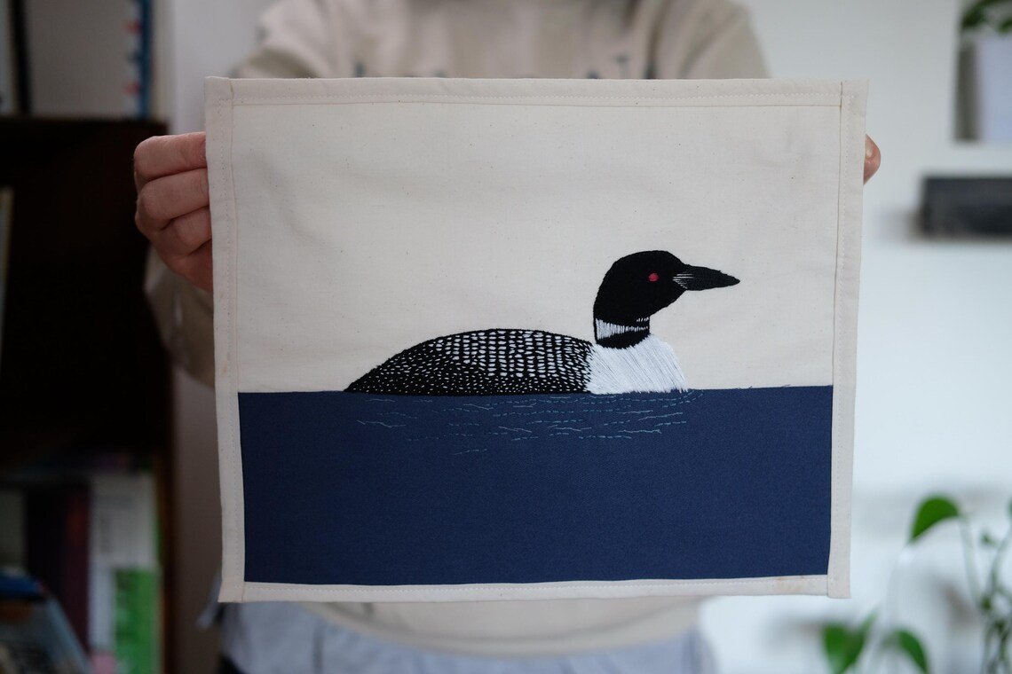 Hand embroidered Common Loon Art piece. 