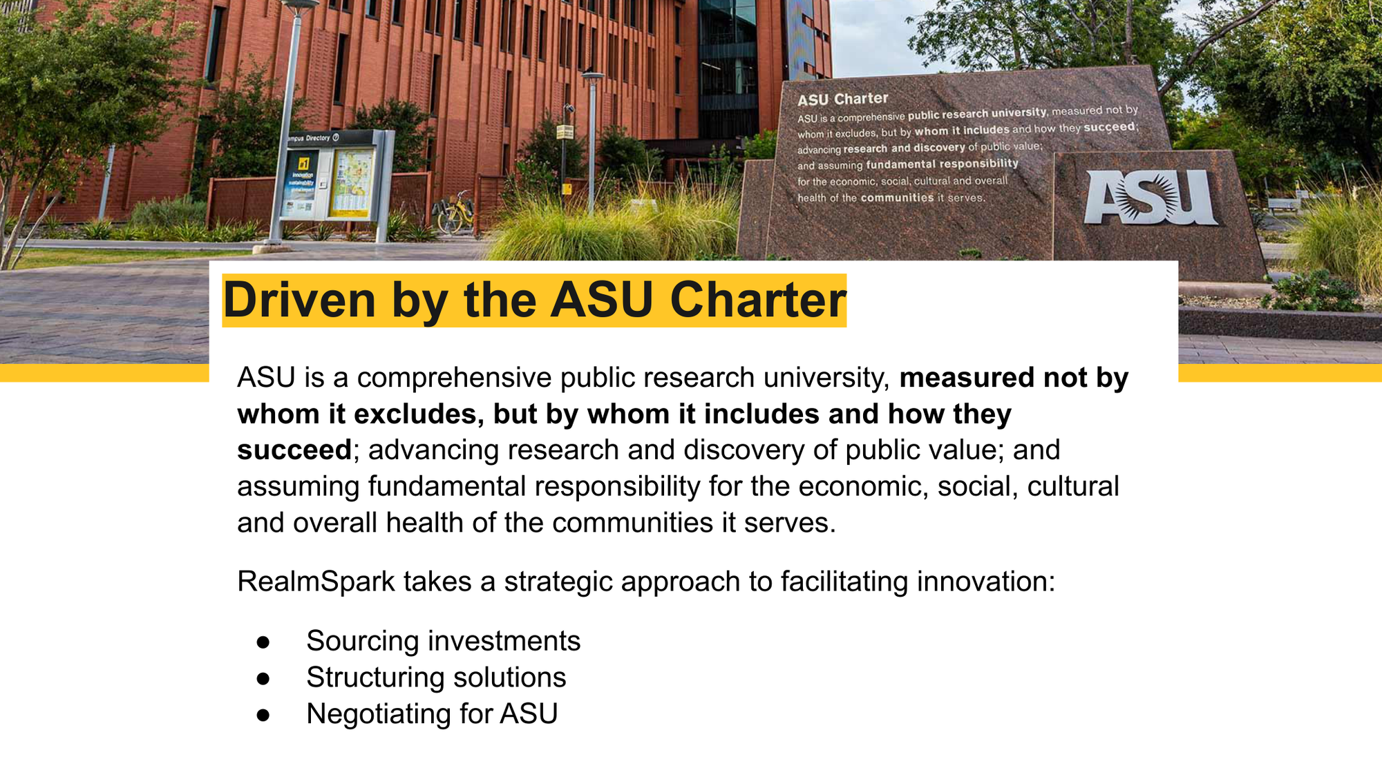 Photo of Arizona State University campus entrance with a large granite sign displaying ASU and a charter statement. The background has a modern brick building, signage, trees, benches, and bicycle racks. Overlaid text reads: 'Driven by the ASU Charter' and describes ASU as a comprehensive public research university.