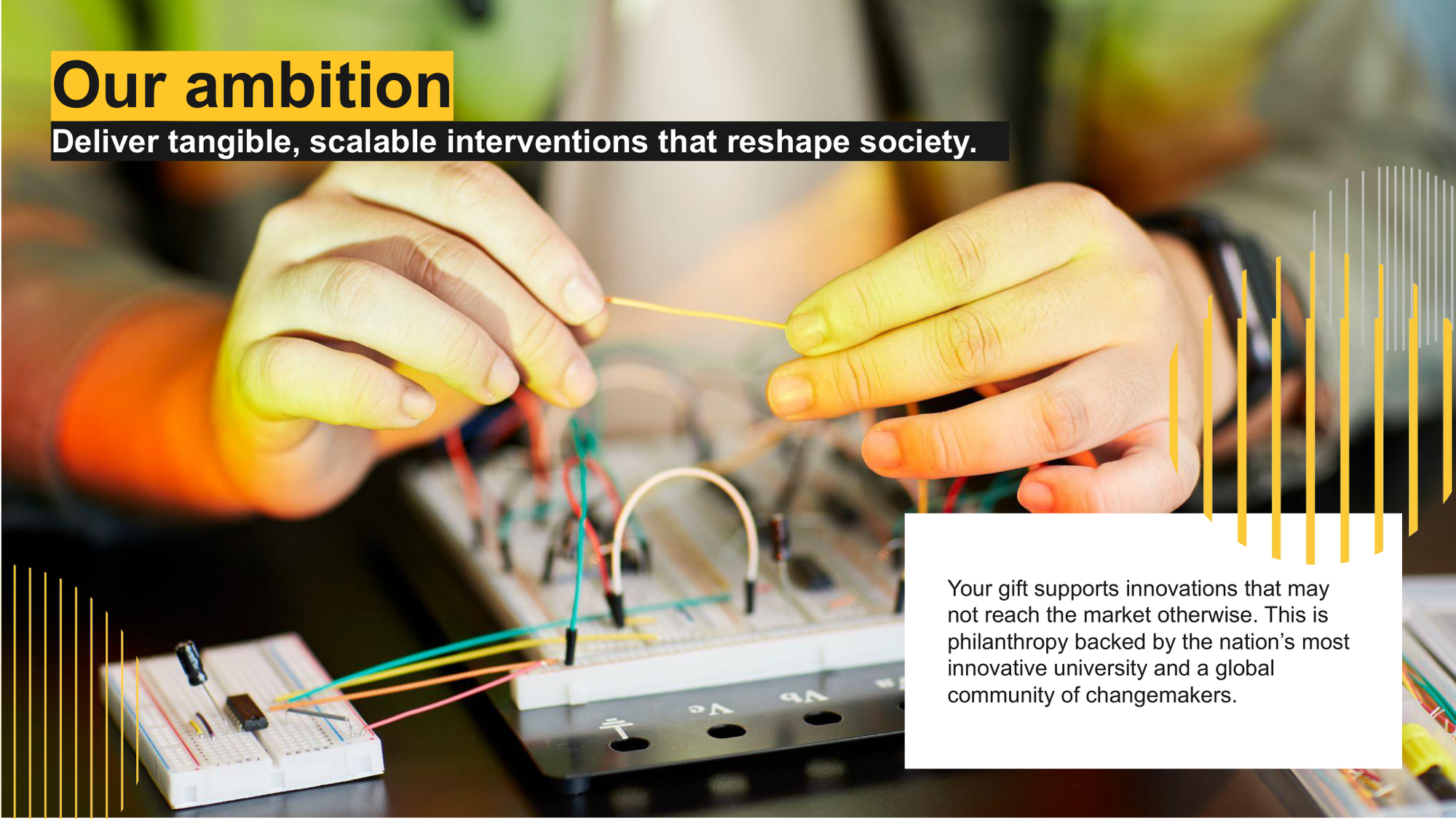 Hands working with electronic components and breadboard on a table.