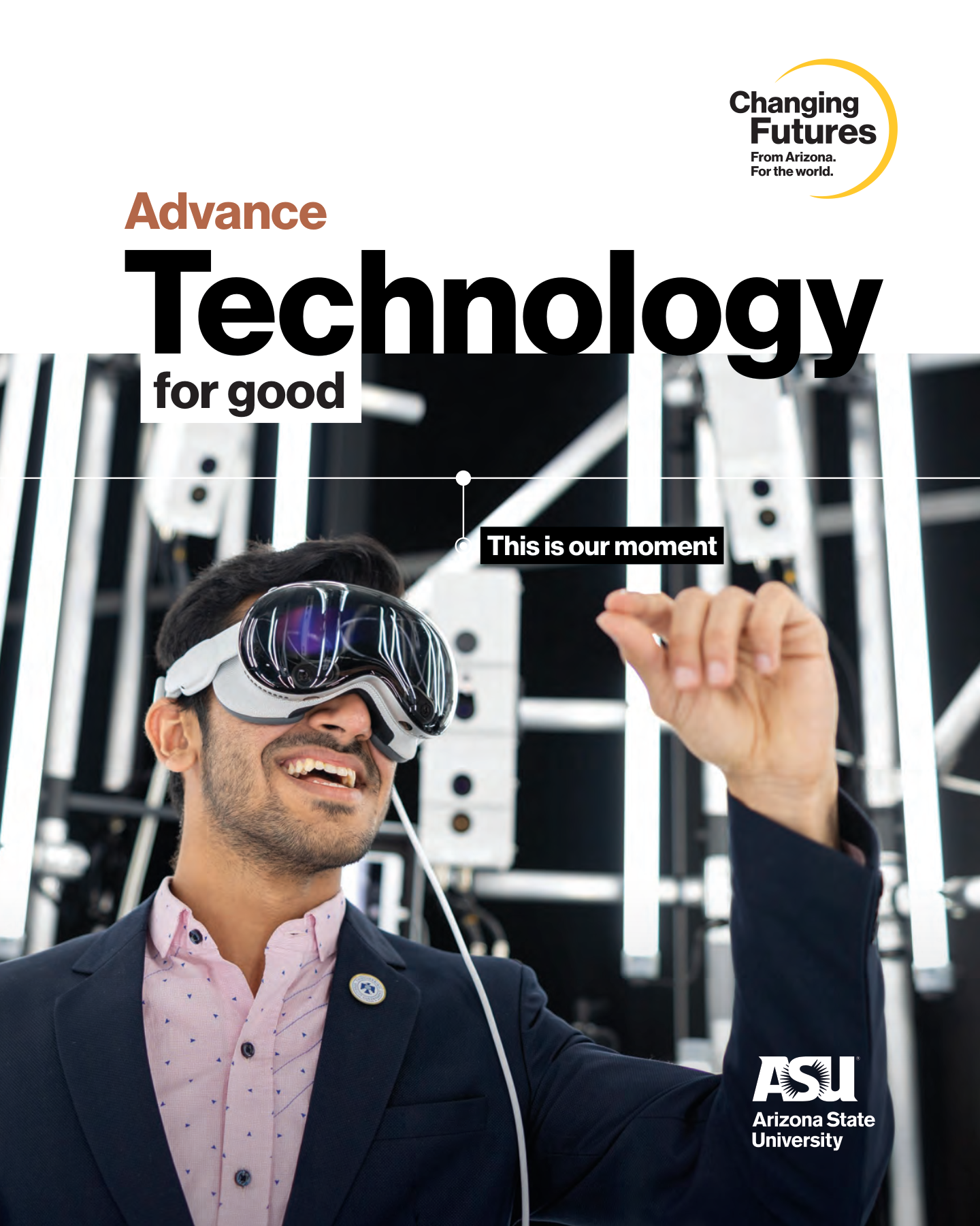 A man wearing virtual reality goggles, smiling, with a person behind him pointing at something. The background features a metallic framework. The image has text that says, "Advance Technology for good" and a logo that says, "Changing Futures From Ari