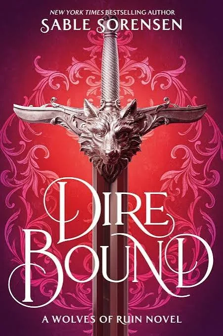 Book cover for "Dire Bound" by Sable Sorensen, featuring a sword with a dragon's head on the hilt and ornate pink designs in the background.