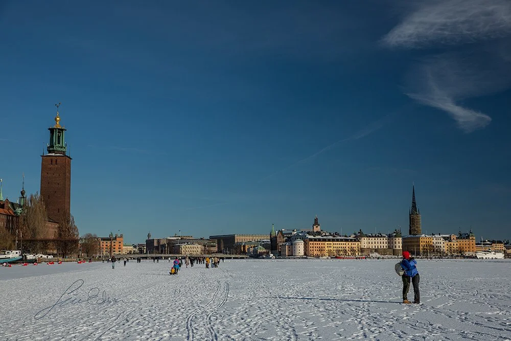 "Young couple pausing for a hug". Pausing for a hug while on a walk on the frozen Mälaren lake in central Stockholm, Sweden