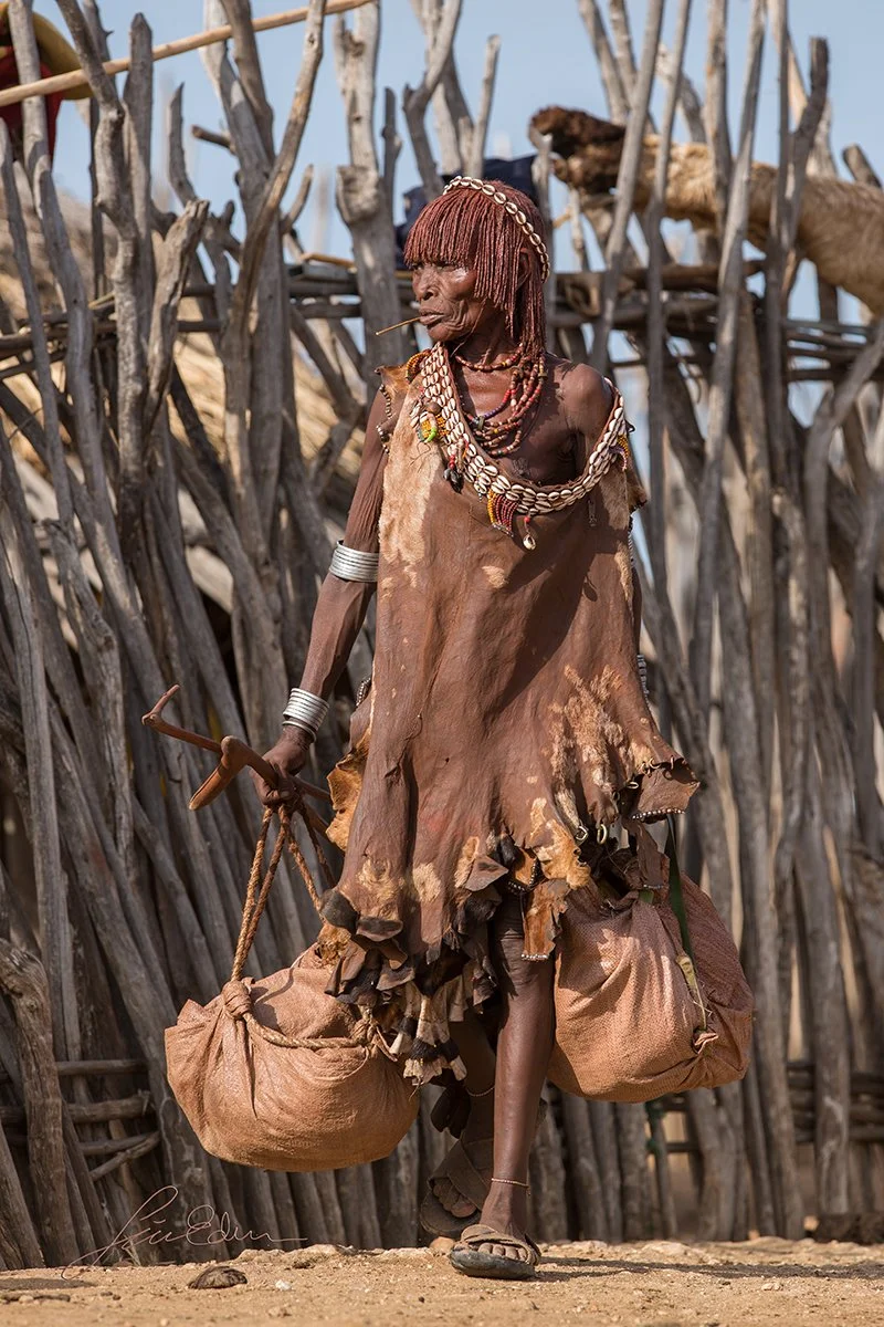 An elderly woman in the village.