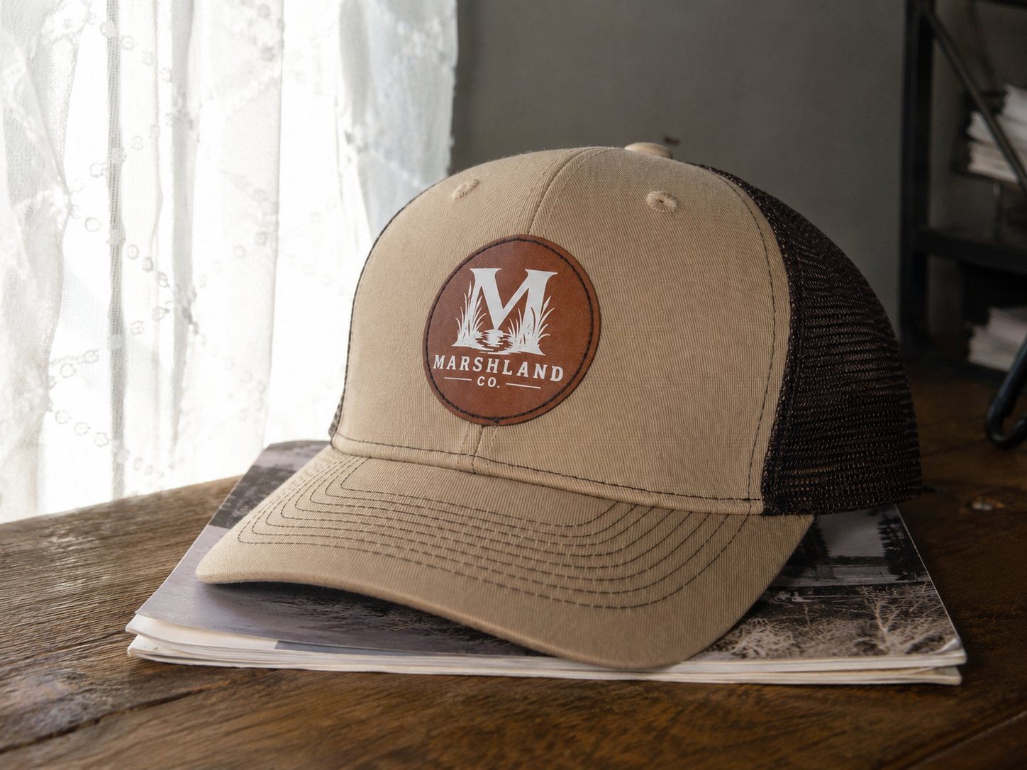 TAN/BROWN TRUCKER HAT W/LEATHER PATCH