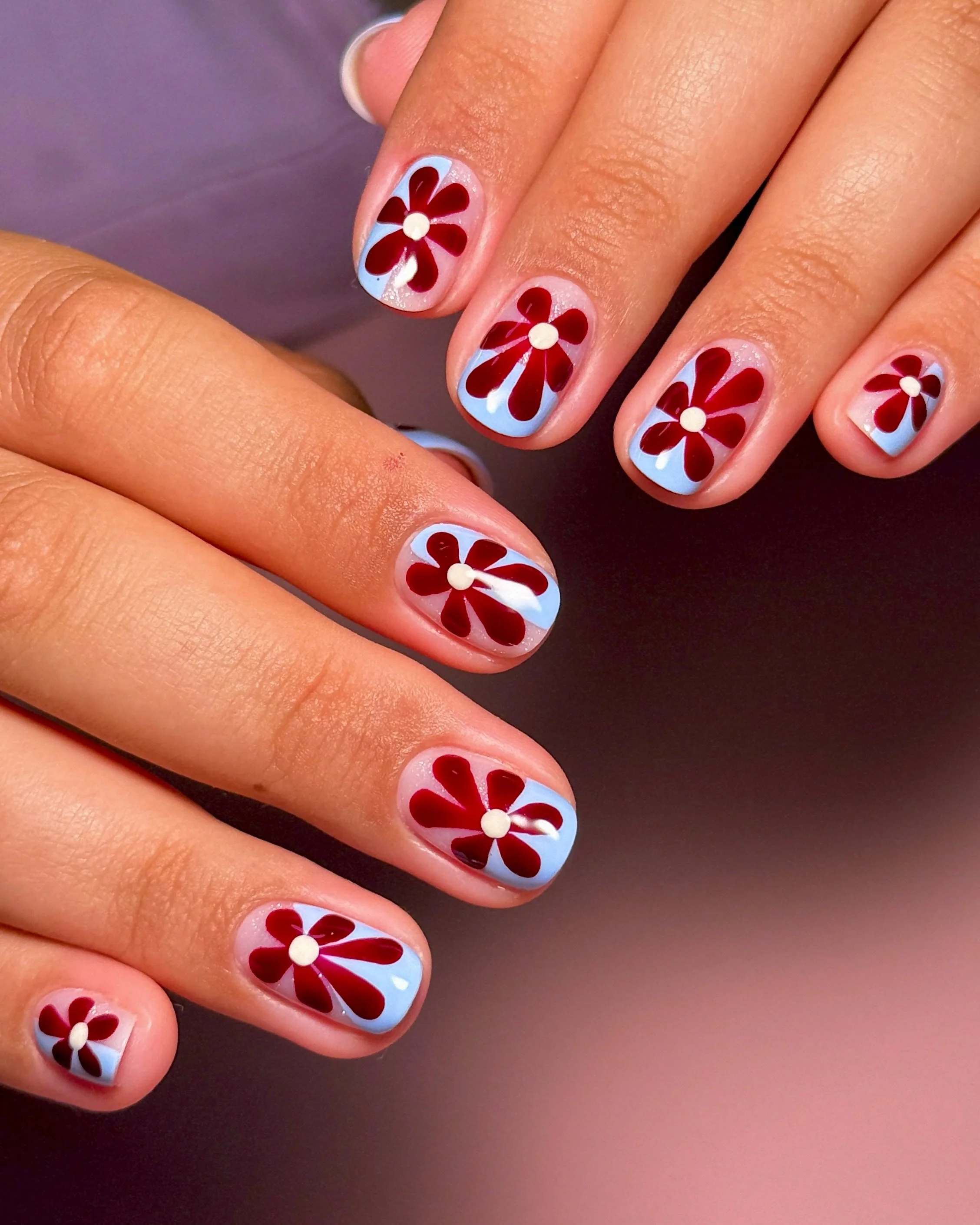 🩵🥀 colorblocky florals 🥀🩵
.
Structured Gel Manicure 
Tier 3 Nail Art
.
#colorblocknails #abstractflowernails #summernails #flowernailart #burgundynails