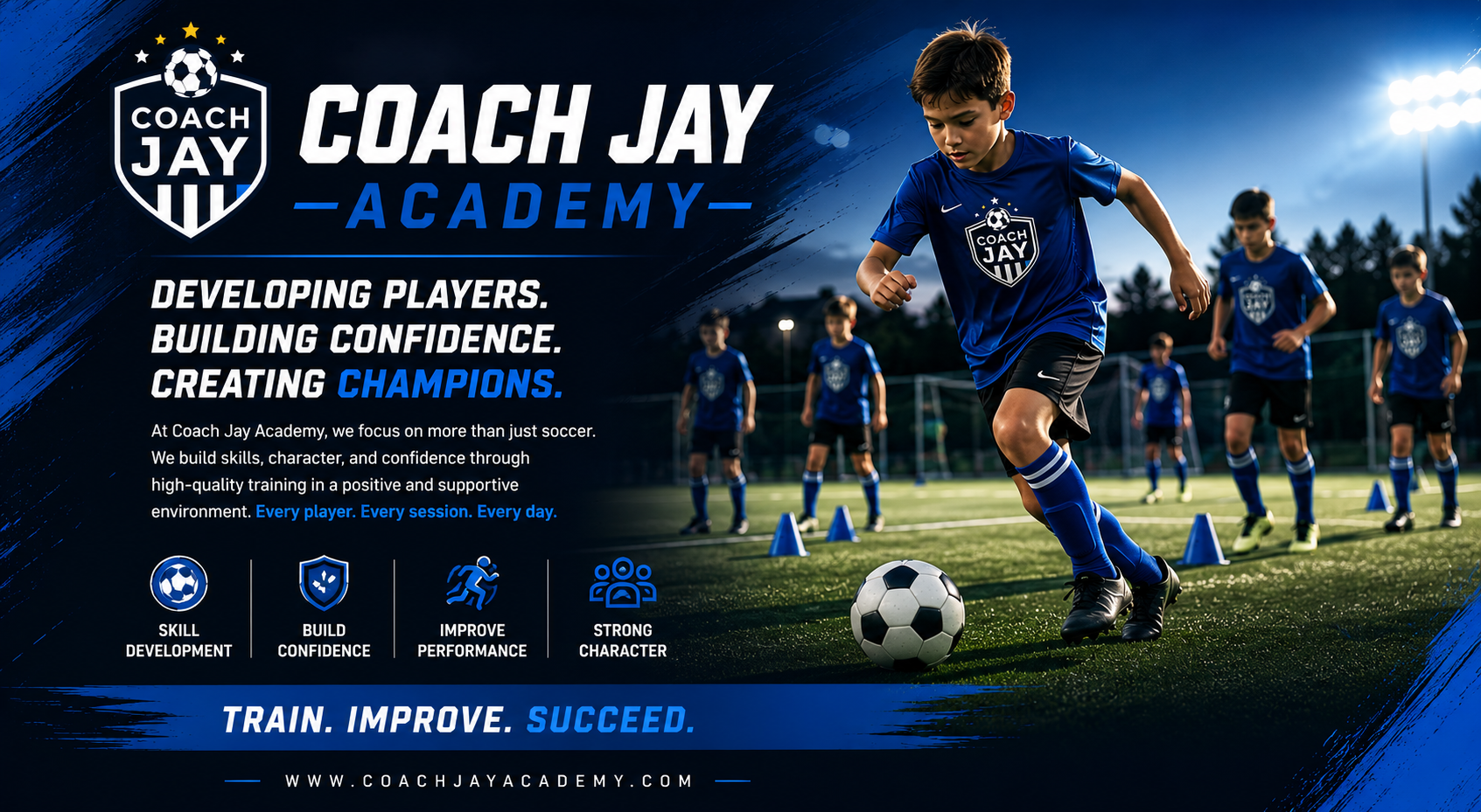 Young boy in blue soccer uniform dribbling soccer ball during training session on field at Coach Jay Academy, with other boys in similar uniforms and cones in the background under stadium lights at dusk.