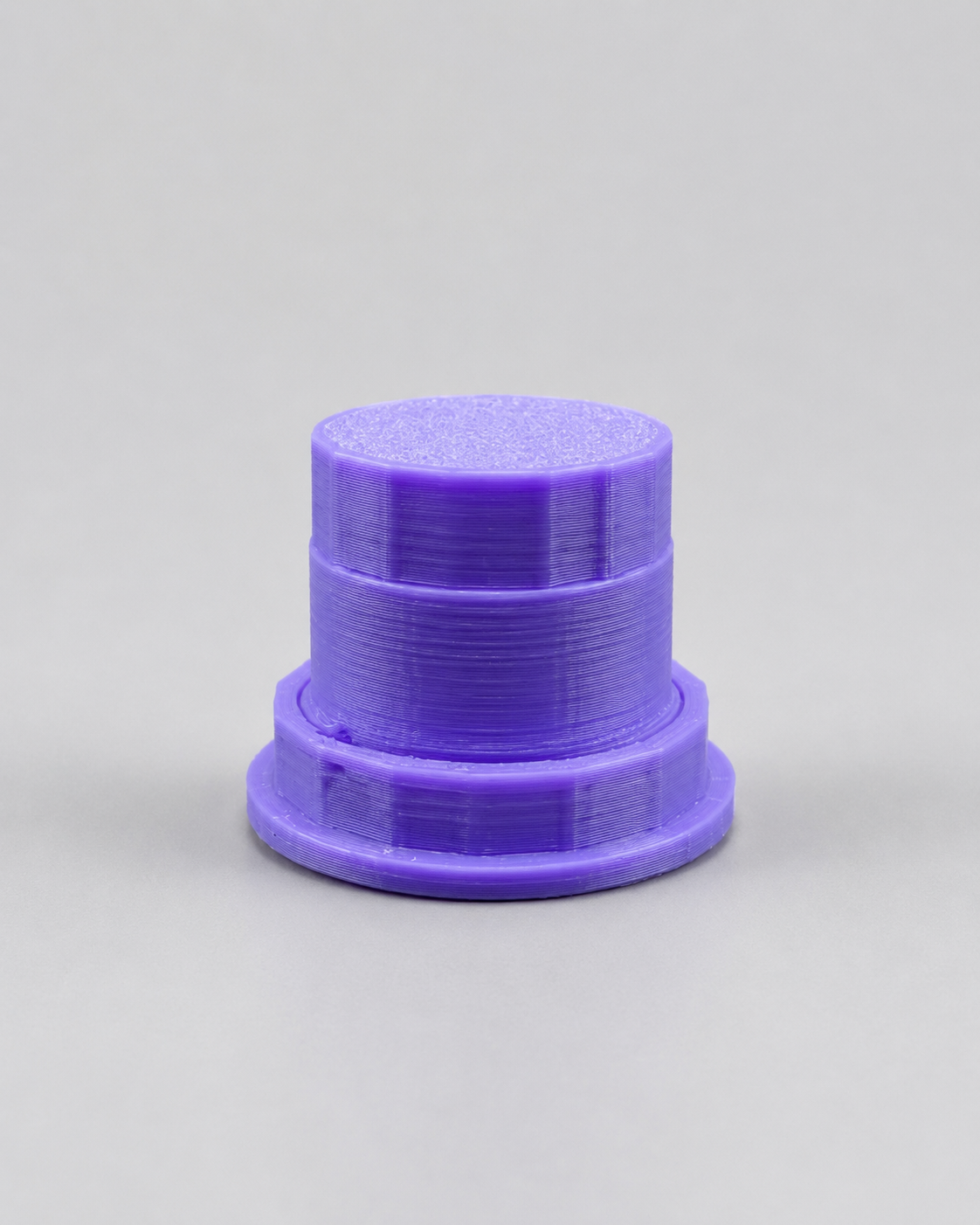 Side view of The Fly Tap 3D printed dispensing cap designed for fruit fly culture lids used by jumping spider and invertebrate keepers.