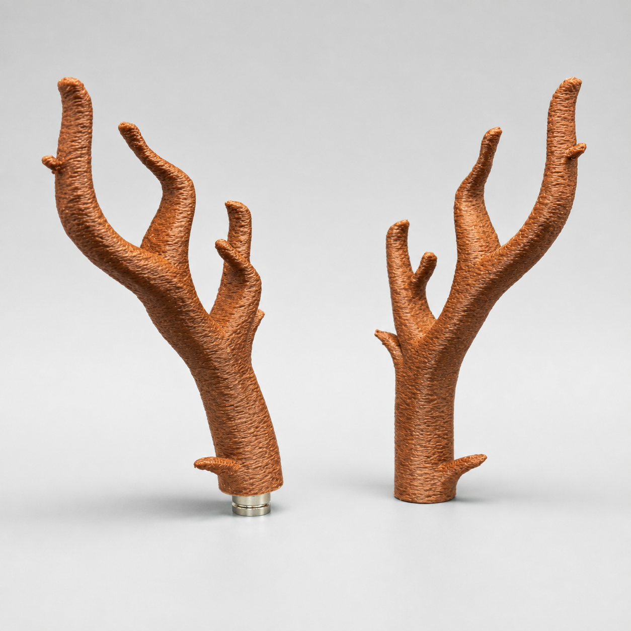 Two upright 3D printed Forest Branch Perches with branching limbs for vertical climbing and enrichment in jumping spider enclosures.