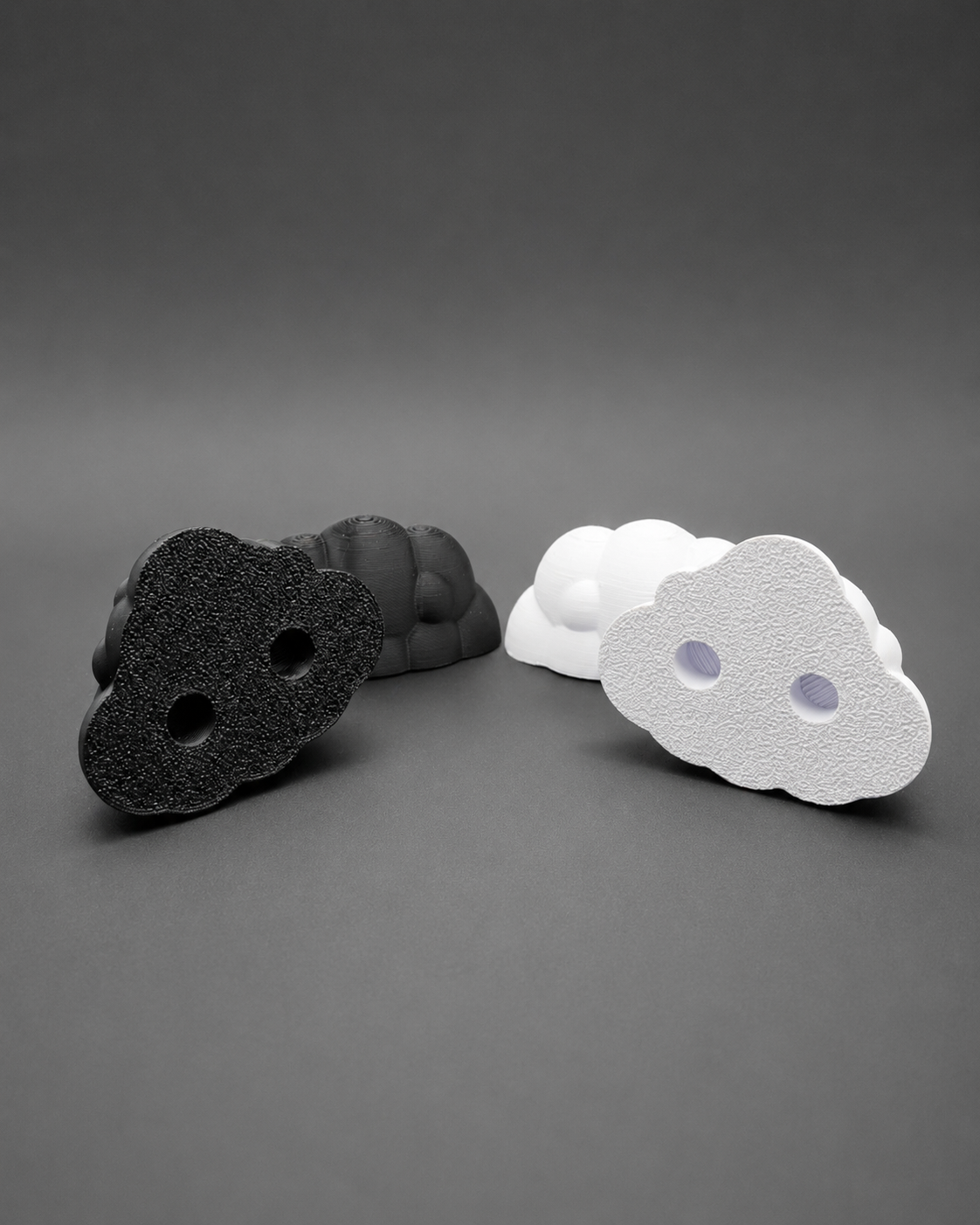 Set of two black and white 3D printed Fluffy Cloud Ledges without magnets for jumping spider enclosure decor.