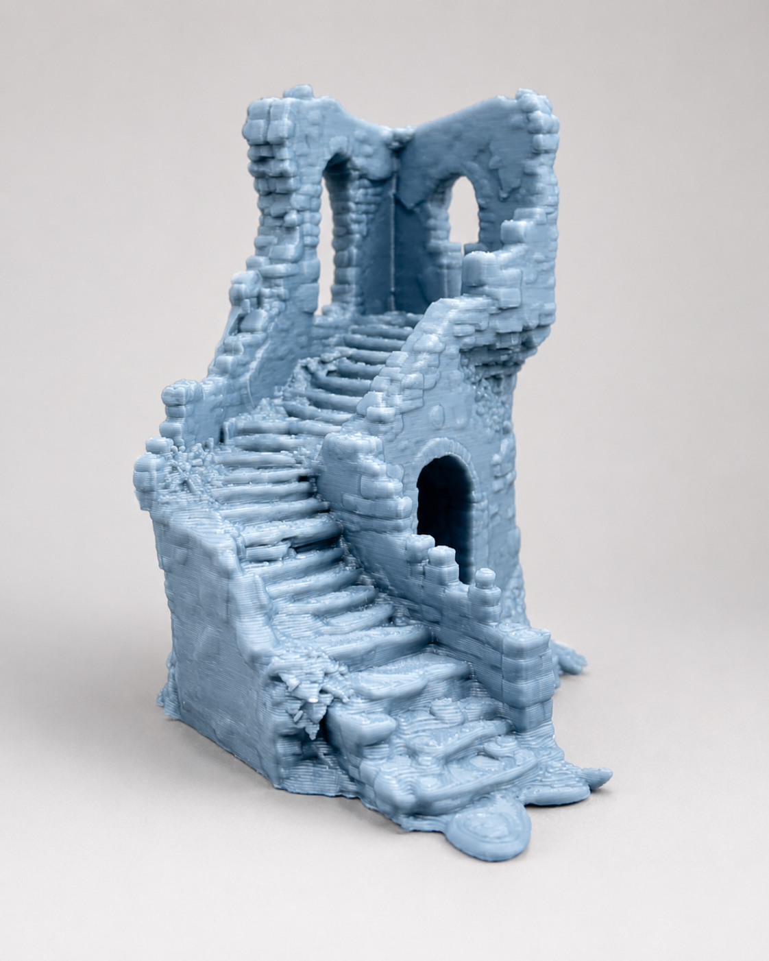 Front view of The Crumbling Keep miniature fantasy ruin for jumping spider enclosure decor.