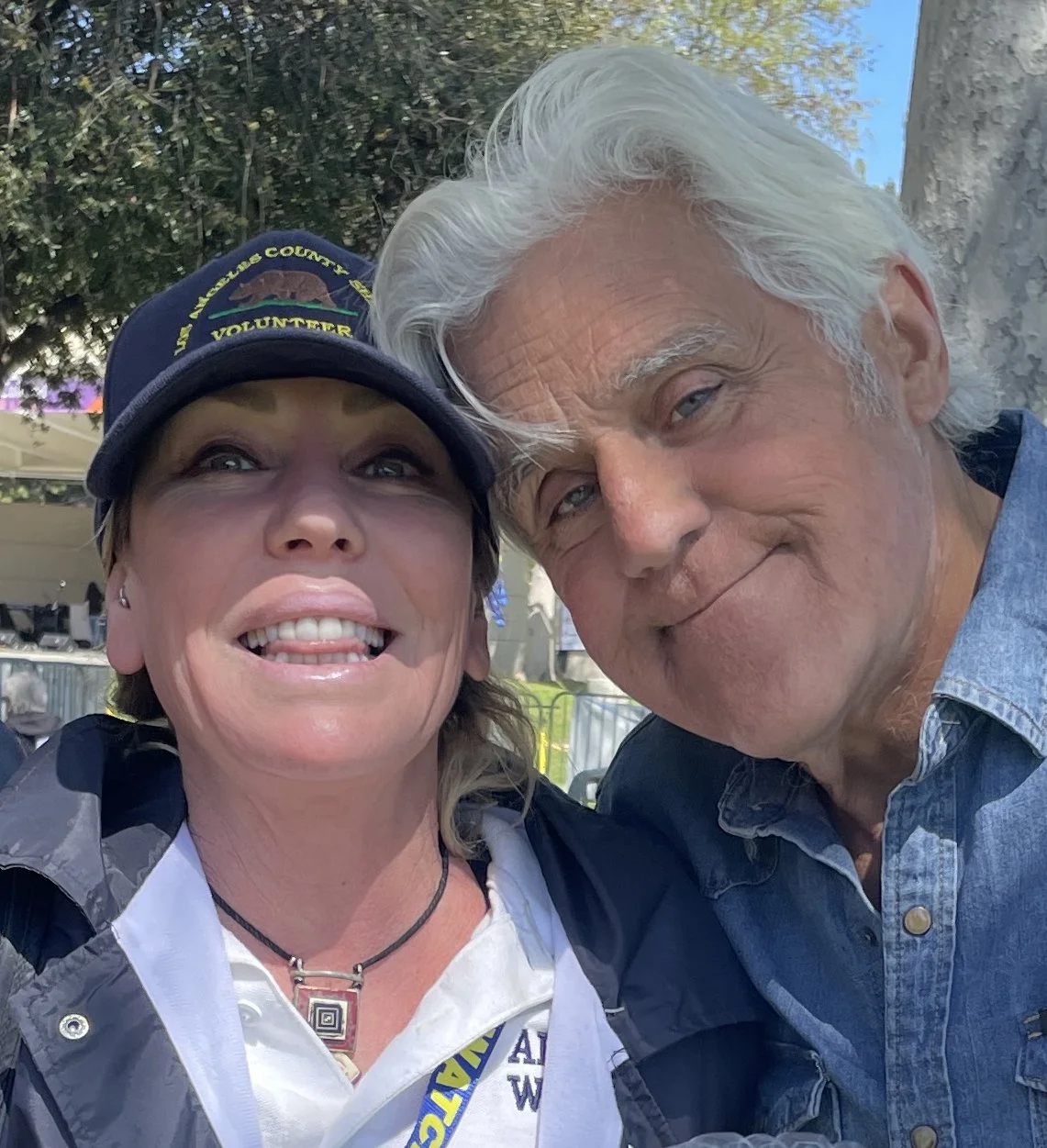 Malibu Arson Watch member smiling with Jay Leno