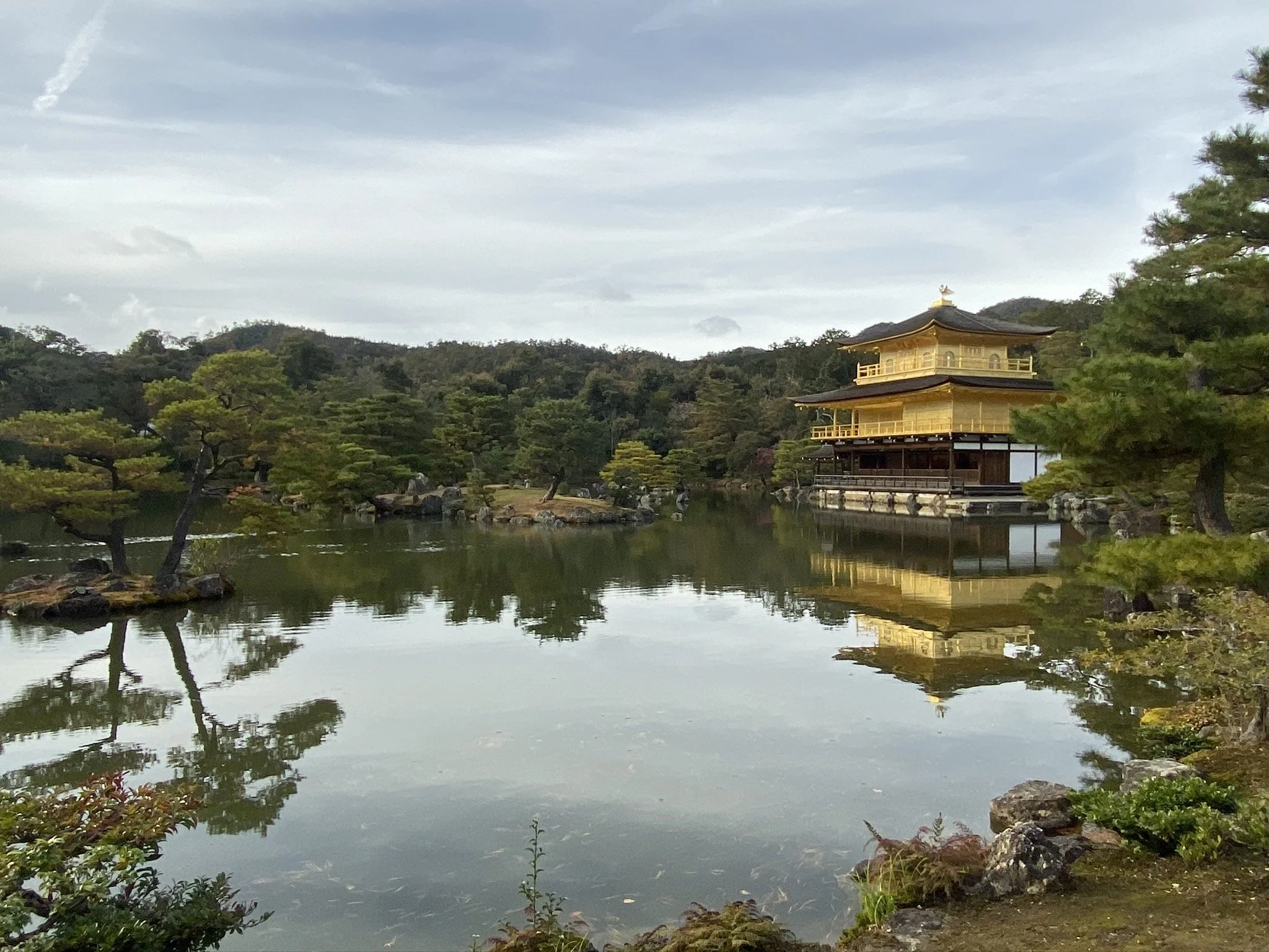 Kinkaku-ji reflected in a pond in Kyoto, Japan.
