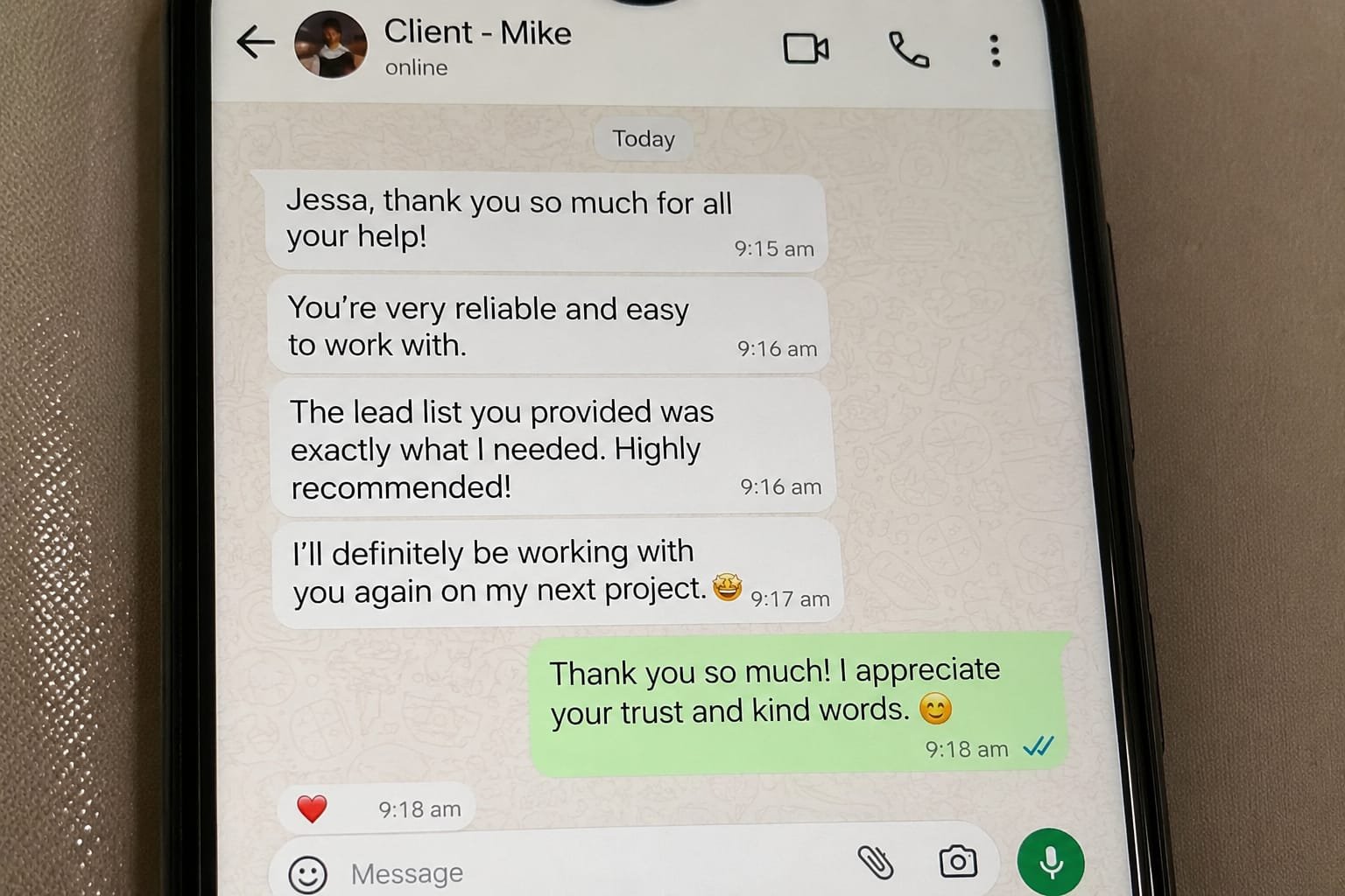 Screenshot of a WhatsApp conversation between a client named Mike and Jessa, showing positive feedback and thanks, with some messages including emojis.