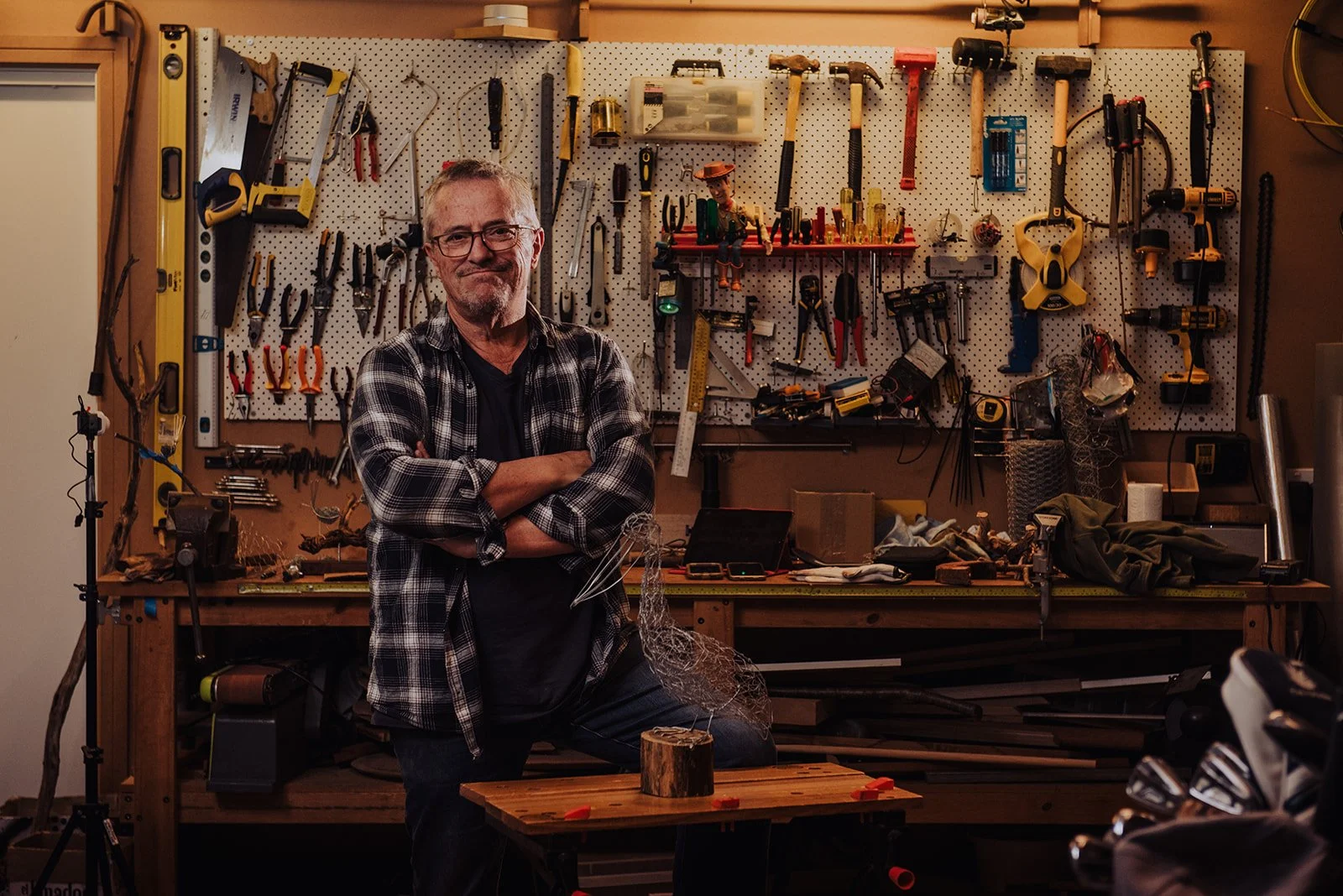 Julian Guy the sculpture artist at the Wire Studio in his maker's garage on the Mornington Peninsula