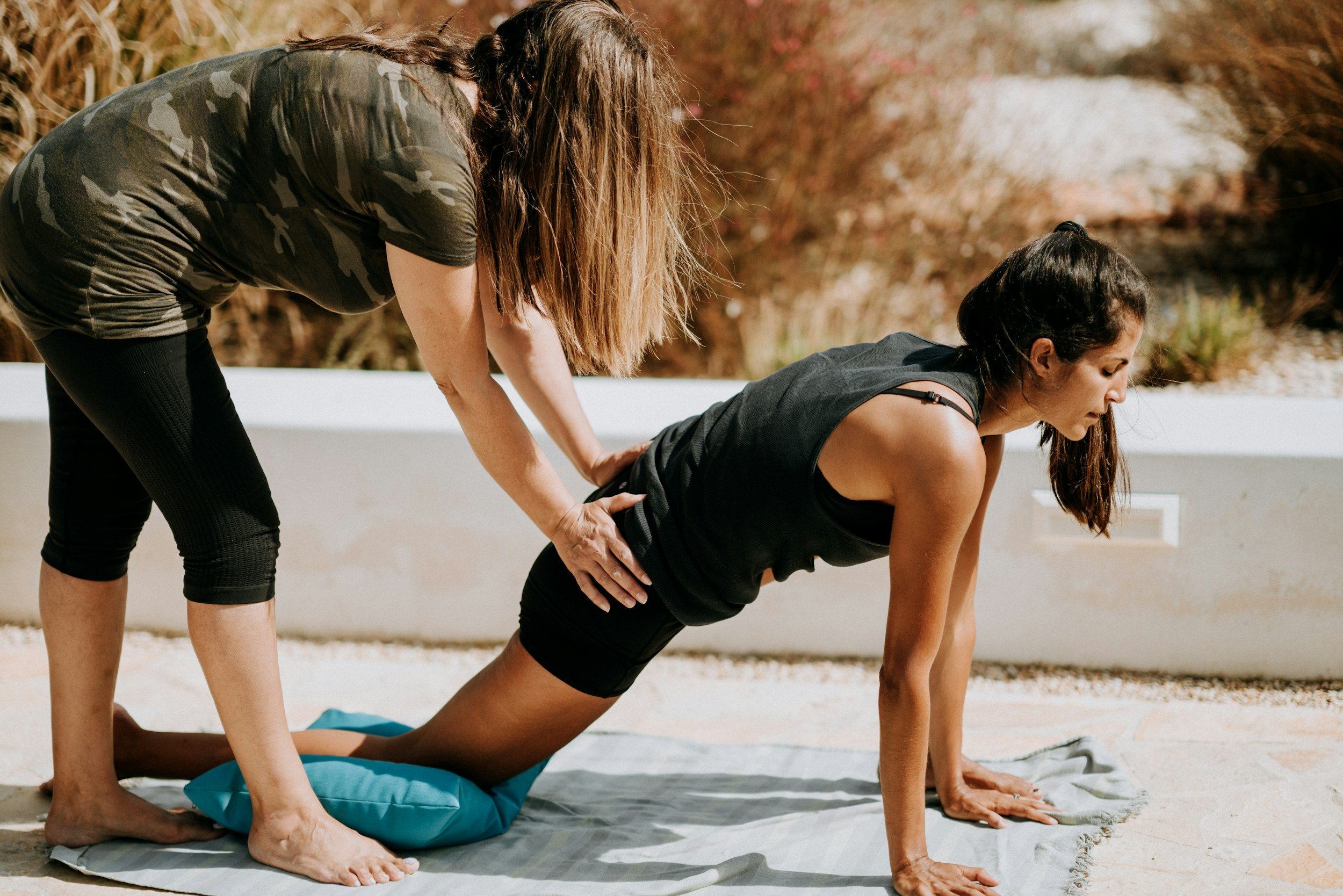 A private yoga therapy session in Barnsley guiding a client through physical adjustment. Targeting healing.
