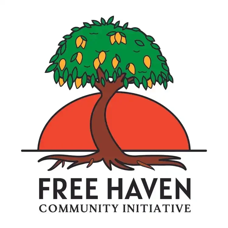 Logo of Free Haven Community Initiative with a tree and a sunset