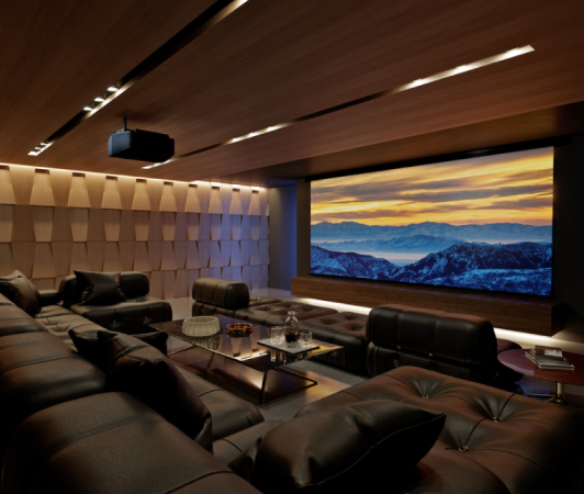 Modern home theater room with leather recliners and a large screen displaying a mountain sunset.