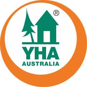 YHA Australia logo with a green house and tree inside an orange circle.
