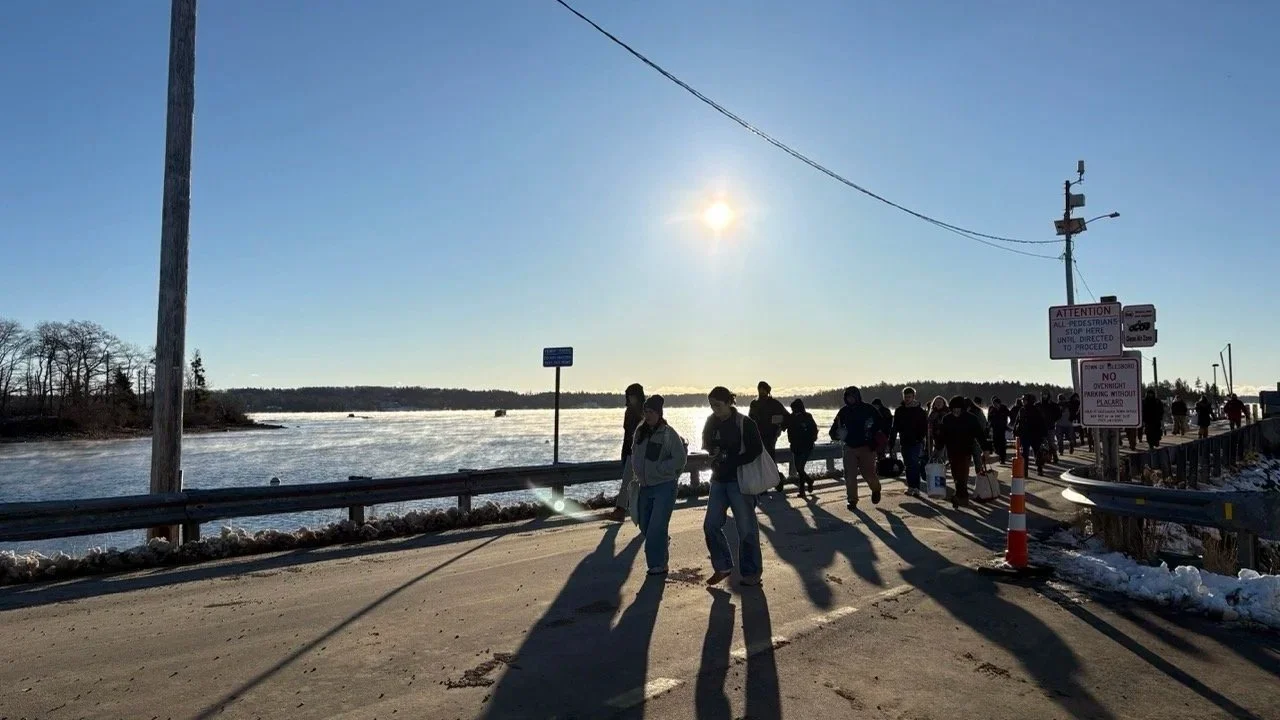 Islesboro Central School magnet students walking off the the ferry at Grindle Point, Islesboro.