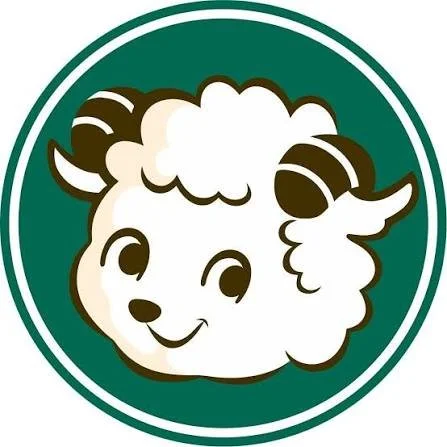 Cute cartoon sheep with a smiling face, inside a green circle.