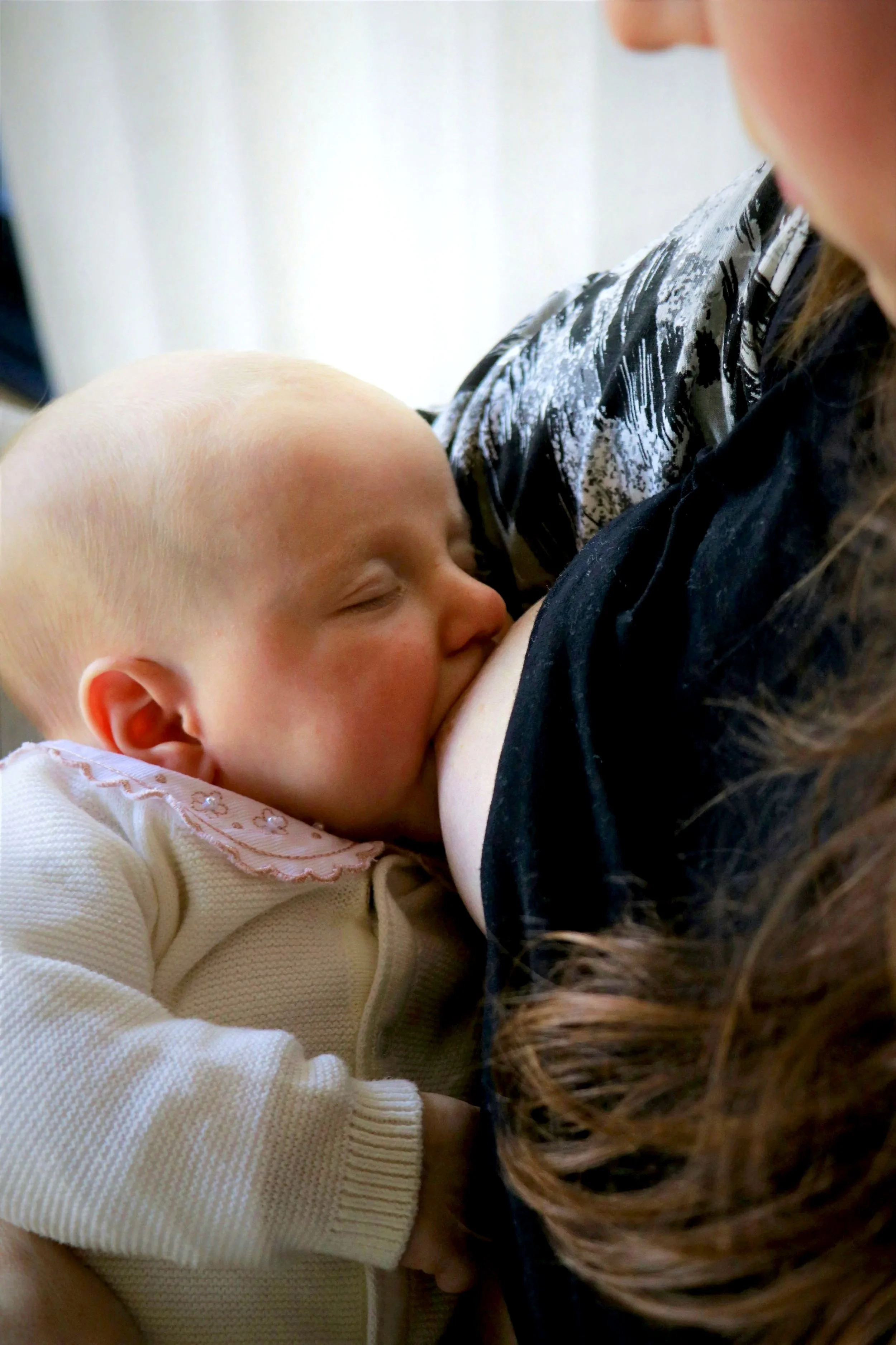 baby breastfeeding during a feeding evaluation