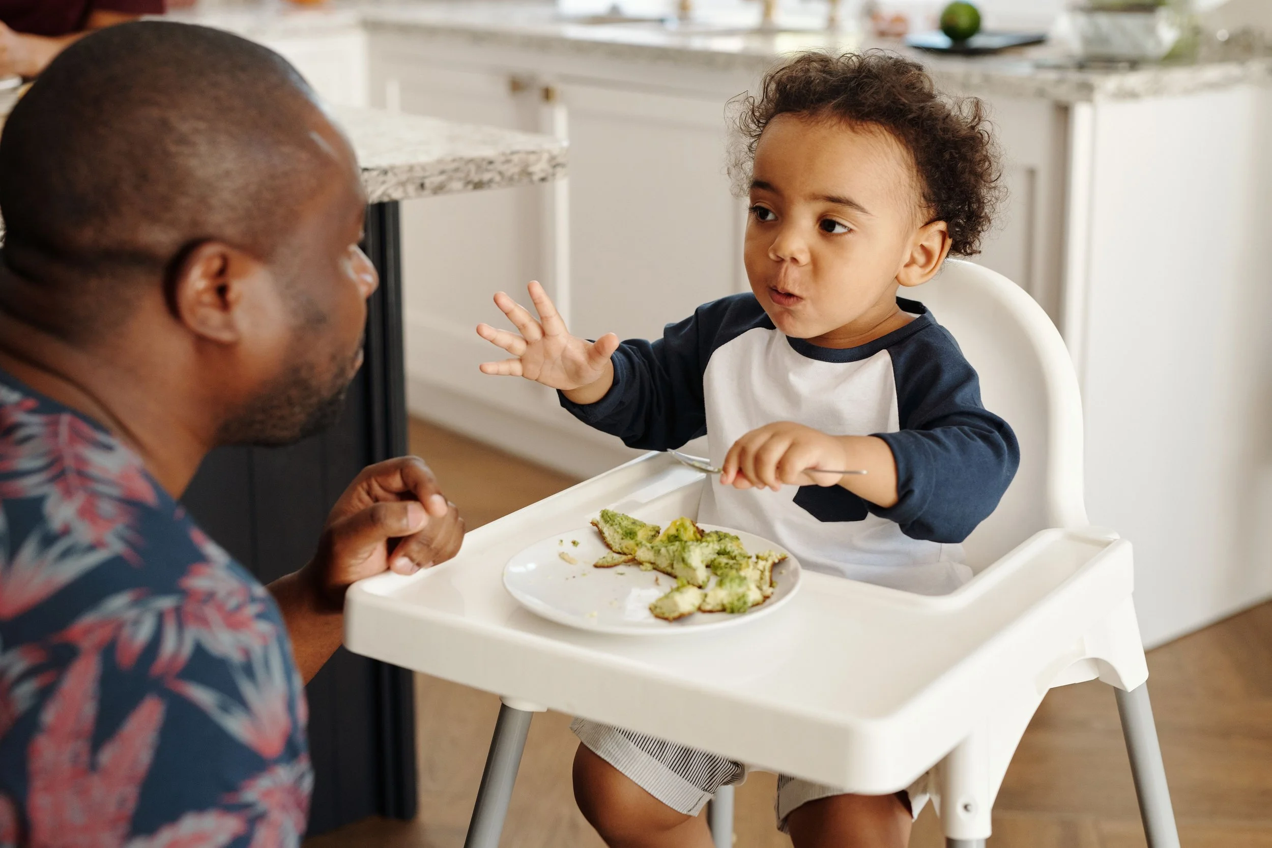 A young father applying the knowledge from the Introduction to Solid Class.