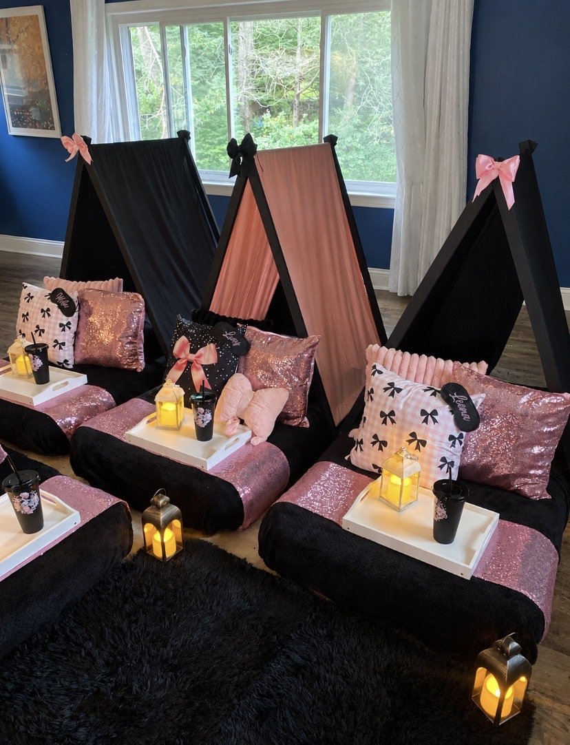 Pink and black luxury teepee sleepover party setup with coquette bows, sequin pillows and personalized décor in Connecticut